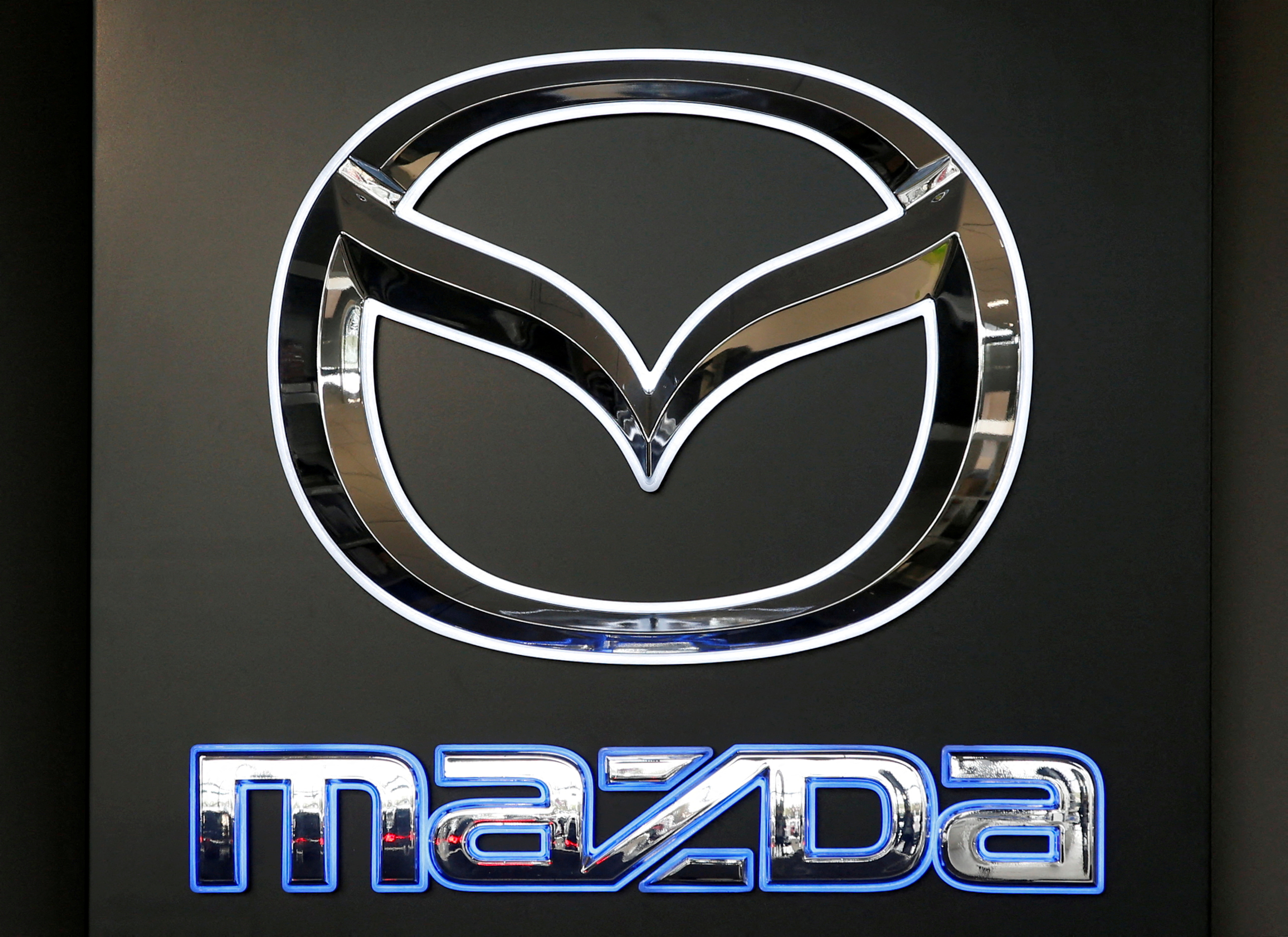 FILE PHOTO: A Mazda logo is seen at a showroom of a dealership in Merignac