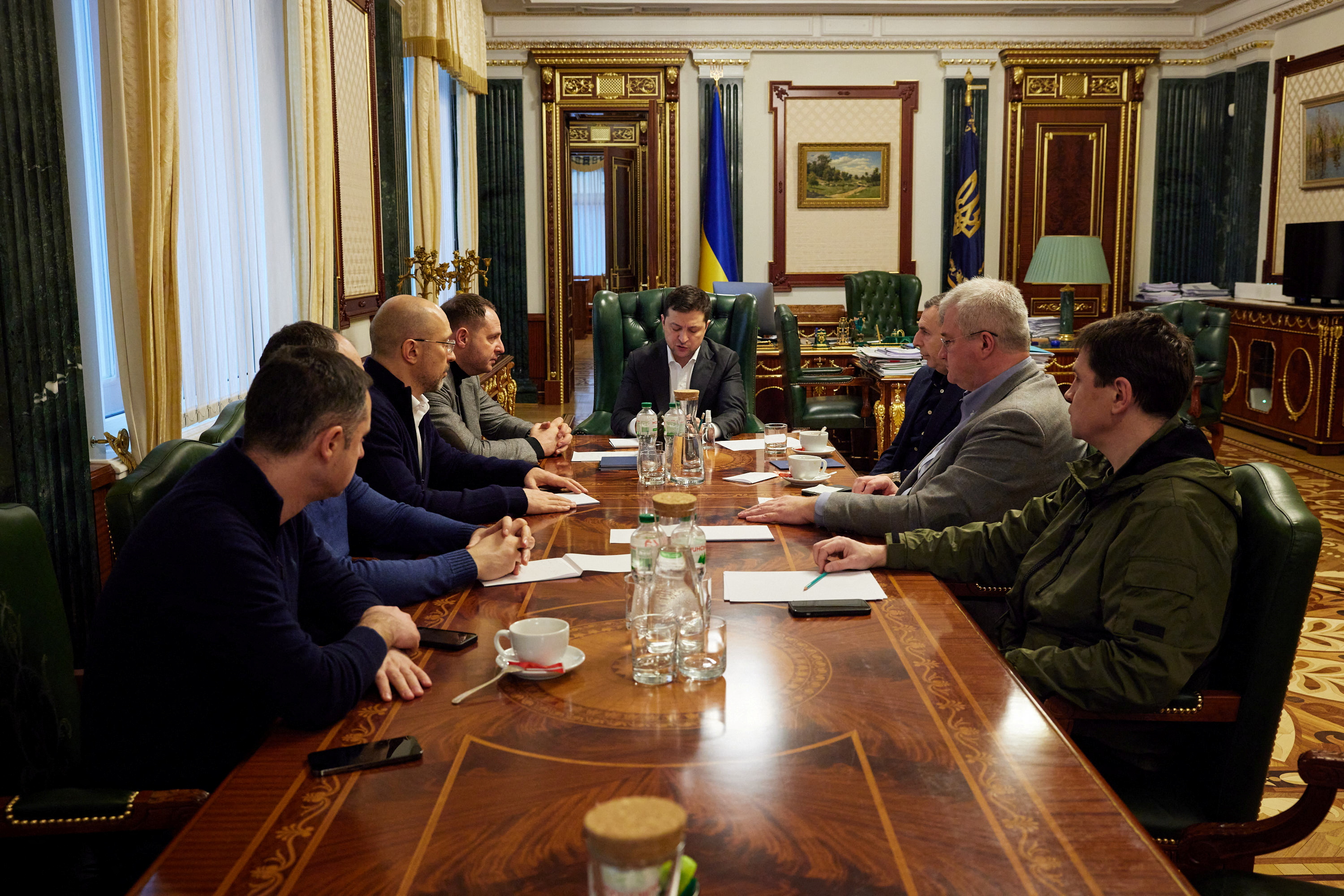 Ukrainian President Volodymyr Zelenskiy chairs an urgent meeting with the leadership of the government, representatives of the defence sector and the economic bloc, in Kyiv, Ukraine February 24, 2022. Ukrainian Presidential Press Service/Handout via REUTERS 
