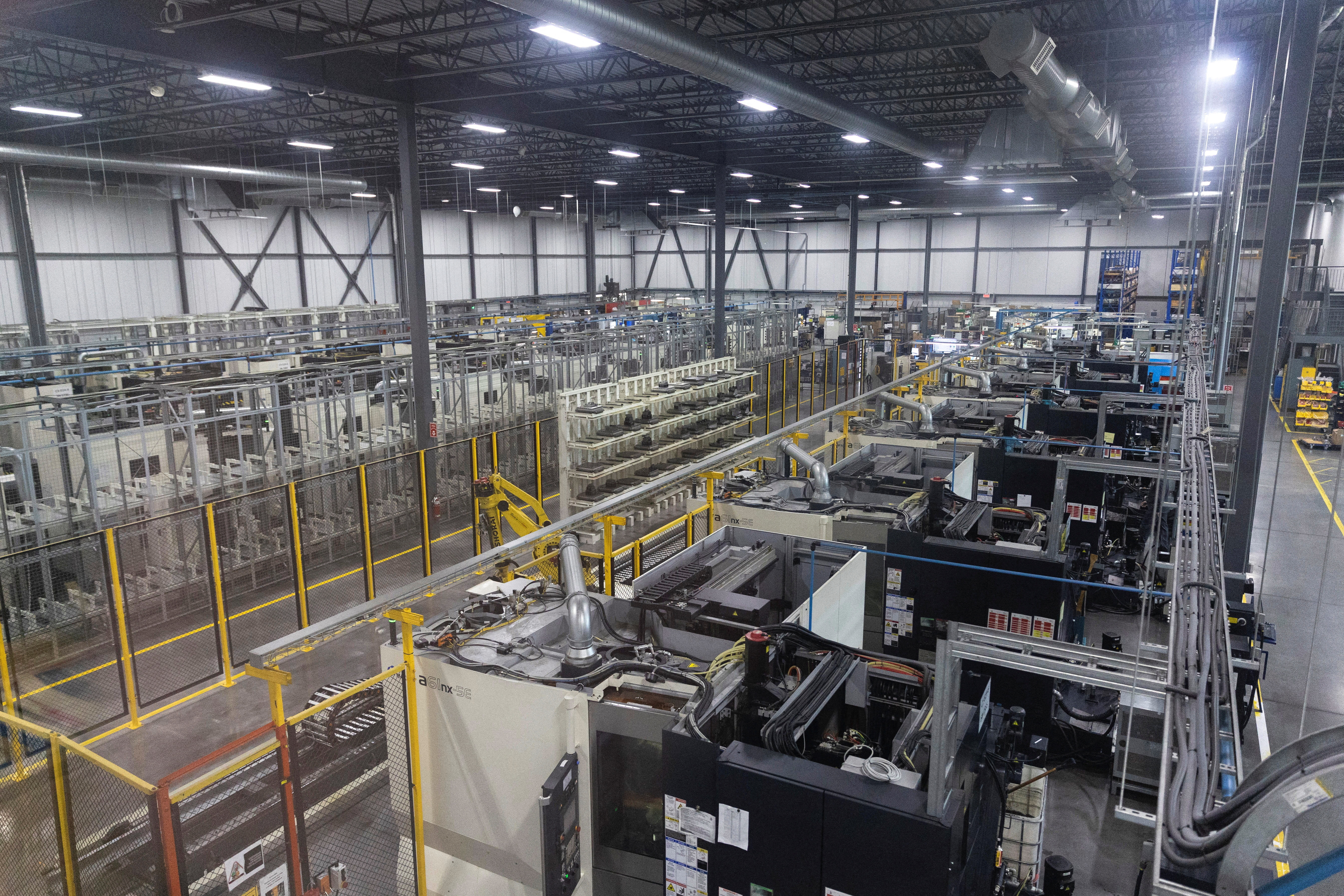 A general view of the factory floor and numerous automated machines used in the production and manufacturing of aircraft parts, at Abipa Canada in Boisbriand