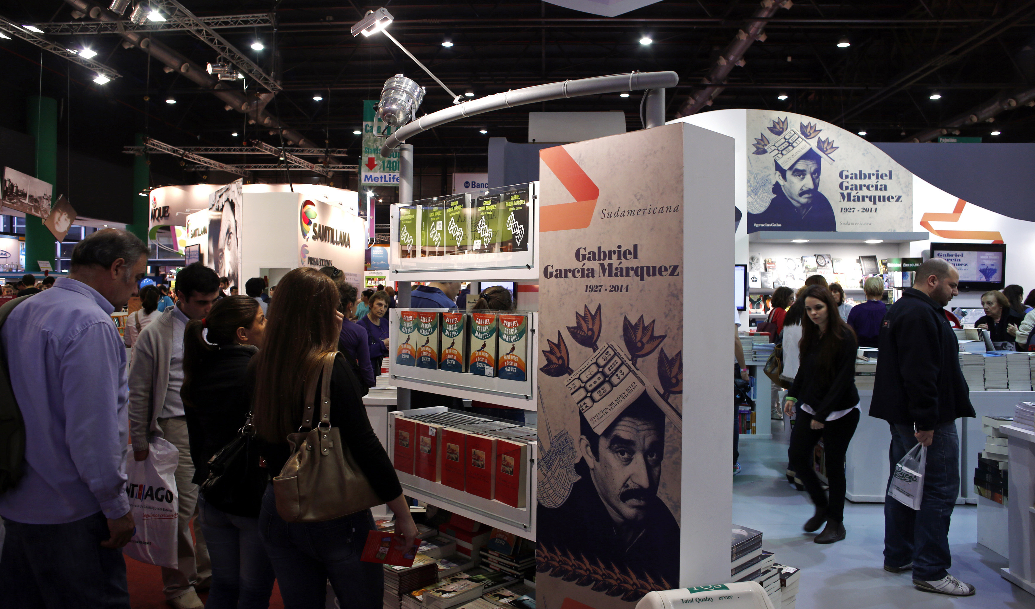 oPeople look at books by Garcia Marquez at Argentina's 40th International Book Fair in Buenos Aires