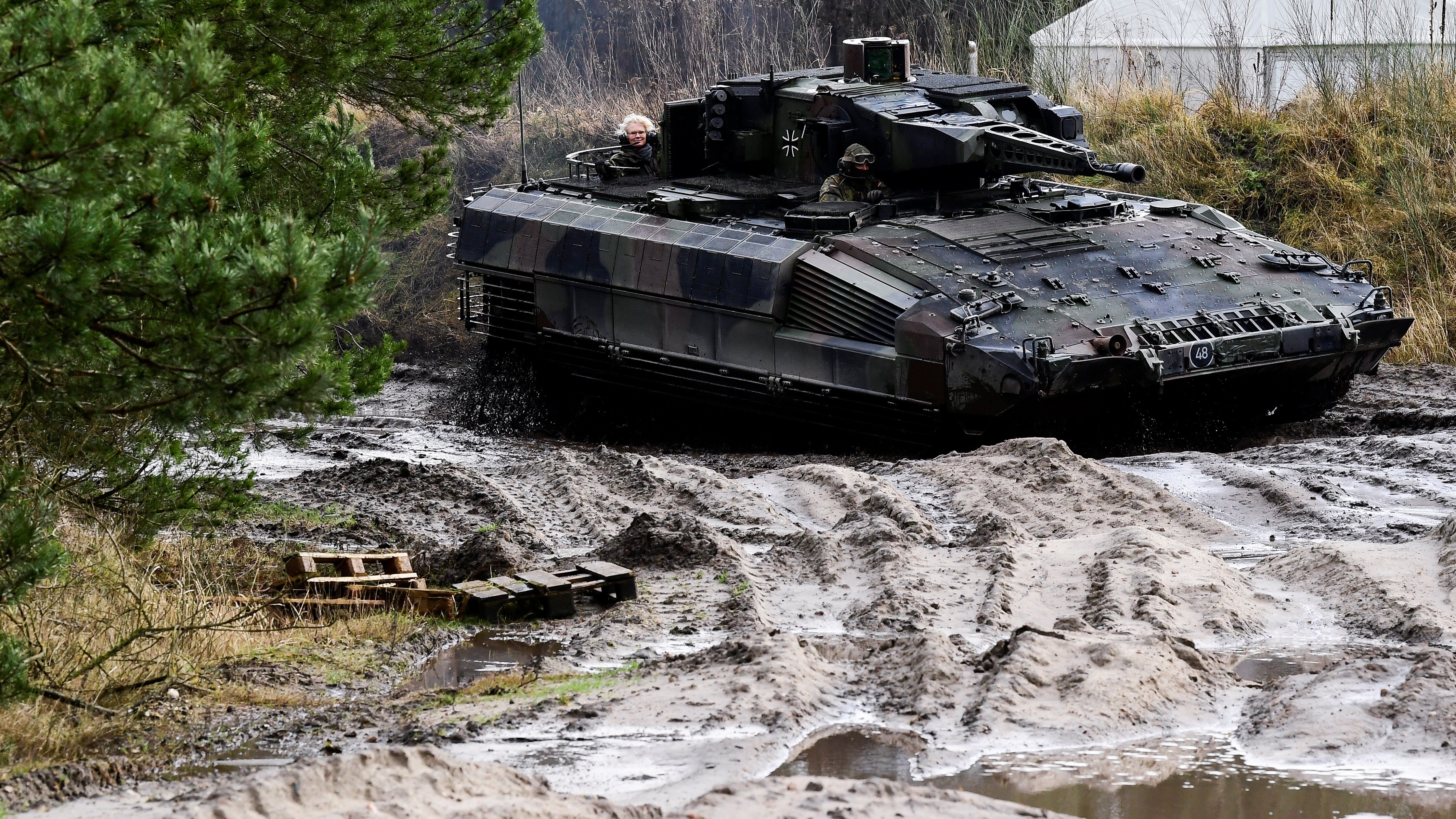 German Defence Minister Christine Lambrecht sits in a Puma fighting tank during her visit at Munster military base