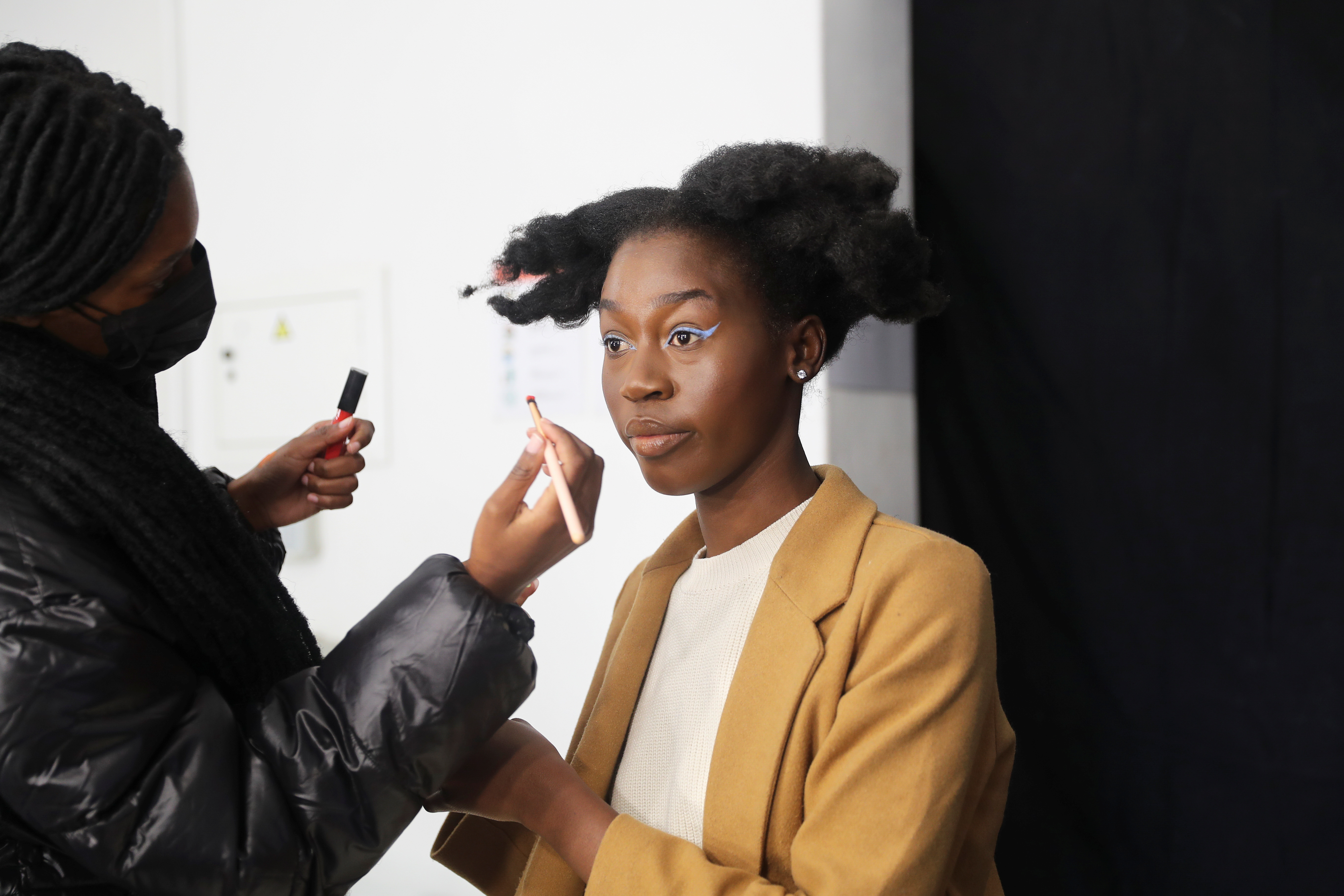 Lehlogonolo Machaba, the first openly transgender woman to compete for the Miss South Africa title has her makeup done before a photo shoot in Johannesburg