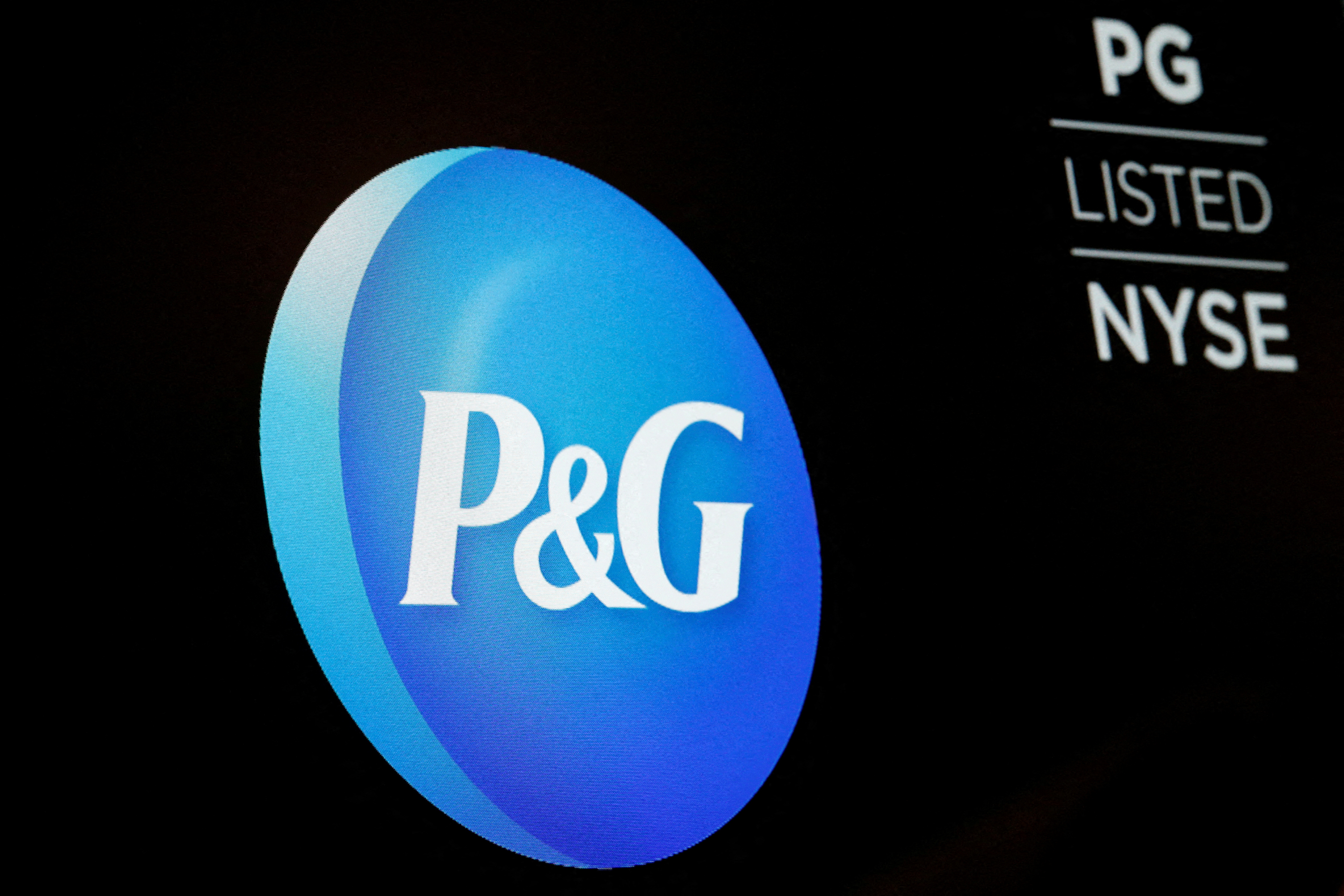 The logo for Procter & Gamble Co. is displayed on a screen on the floor of the NYSE in New York