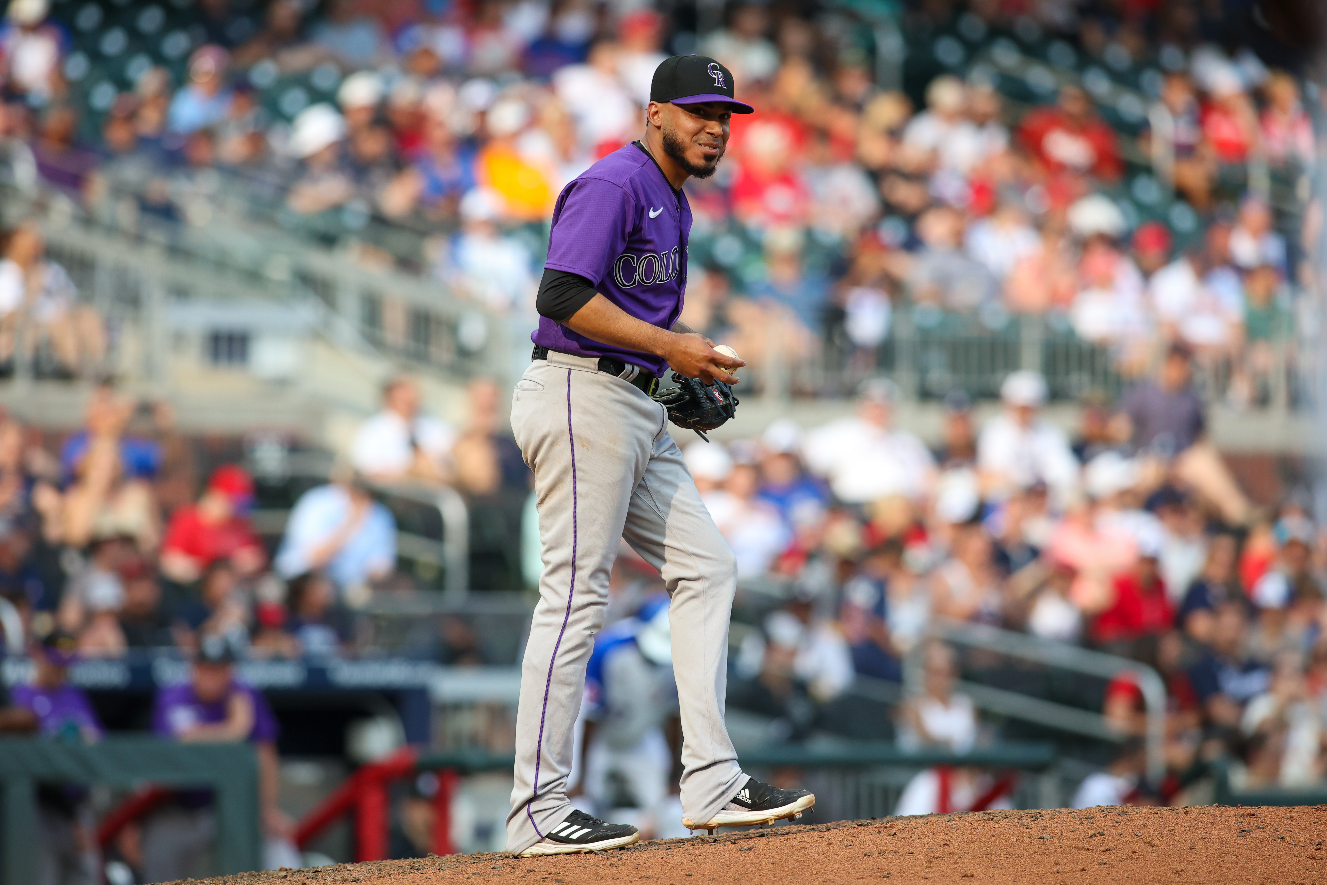 Denver CO, USA. 3rd June, 2022. Atlanta first baseman Matt Olsen (28)  drives in runs int he 10 th inning during the game with Atlanta Braves and  Colorado Rockies held at Coors