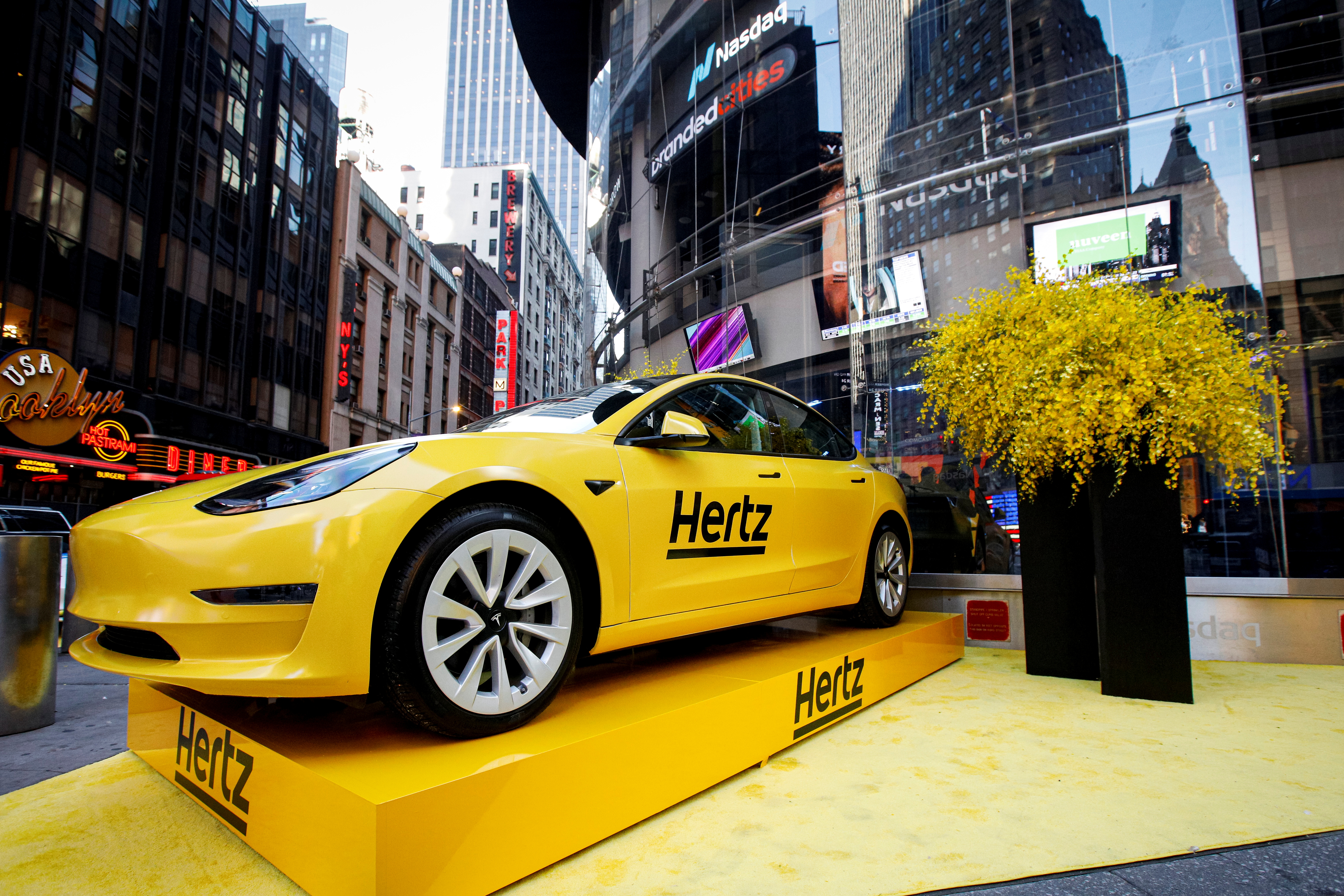 A Hertz Tesla electric vehicle is displayed during the Hertz Corporation IPO at the Nasdaq in New York