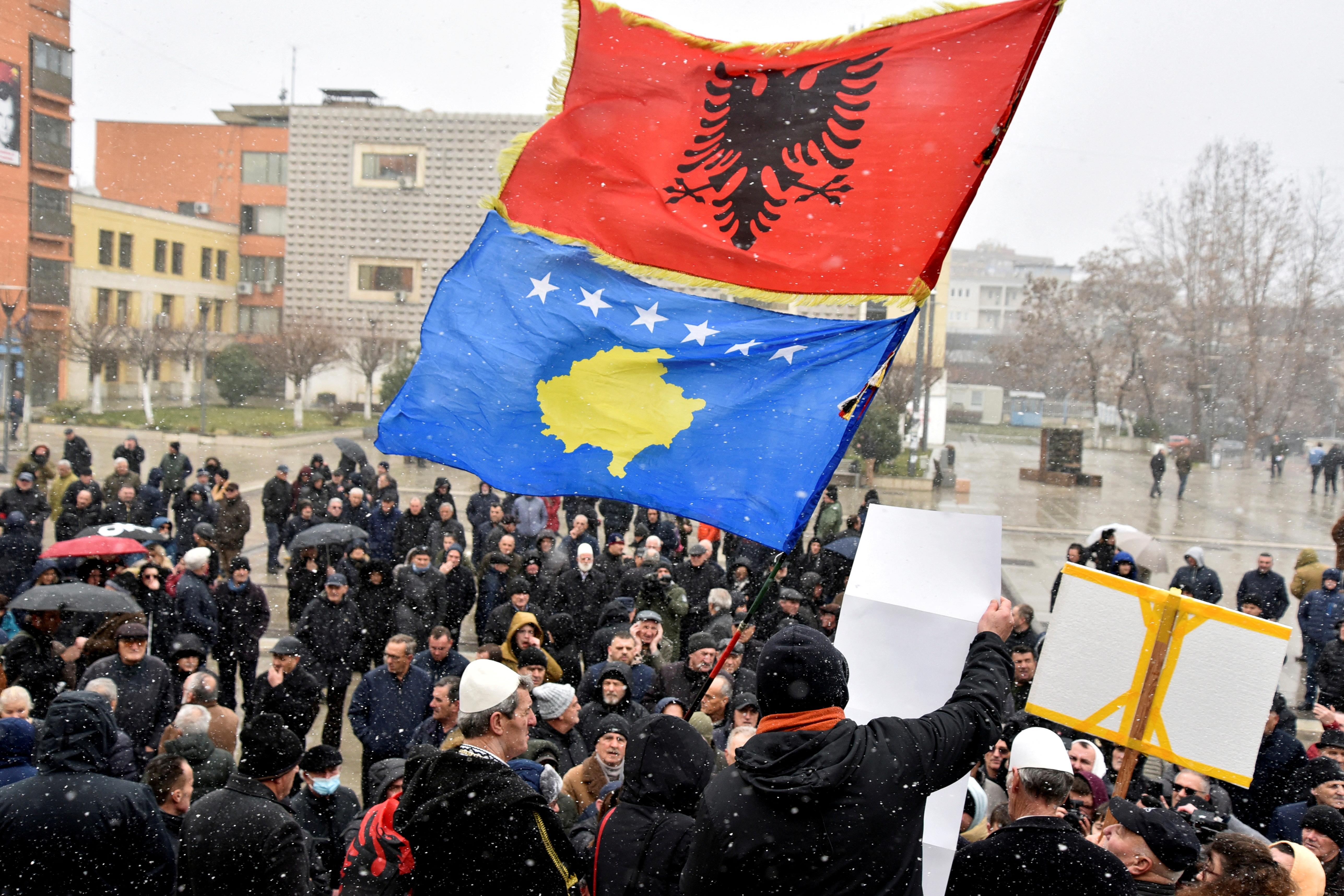 People protest against the Association of municipalities with a Serbian majority in Pristina