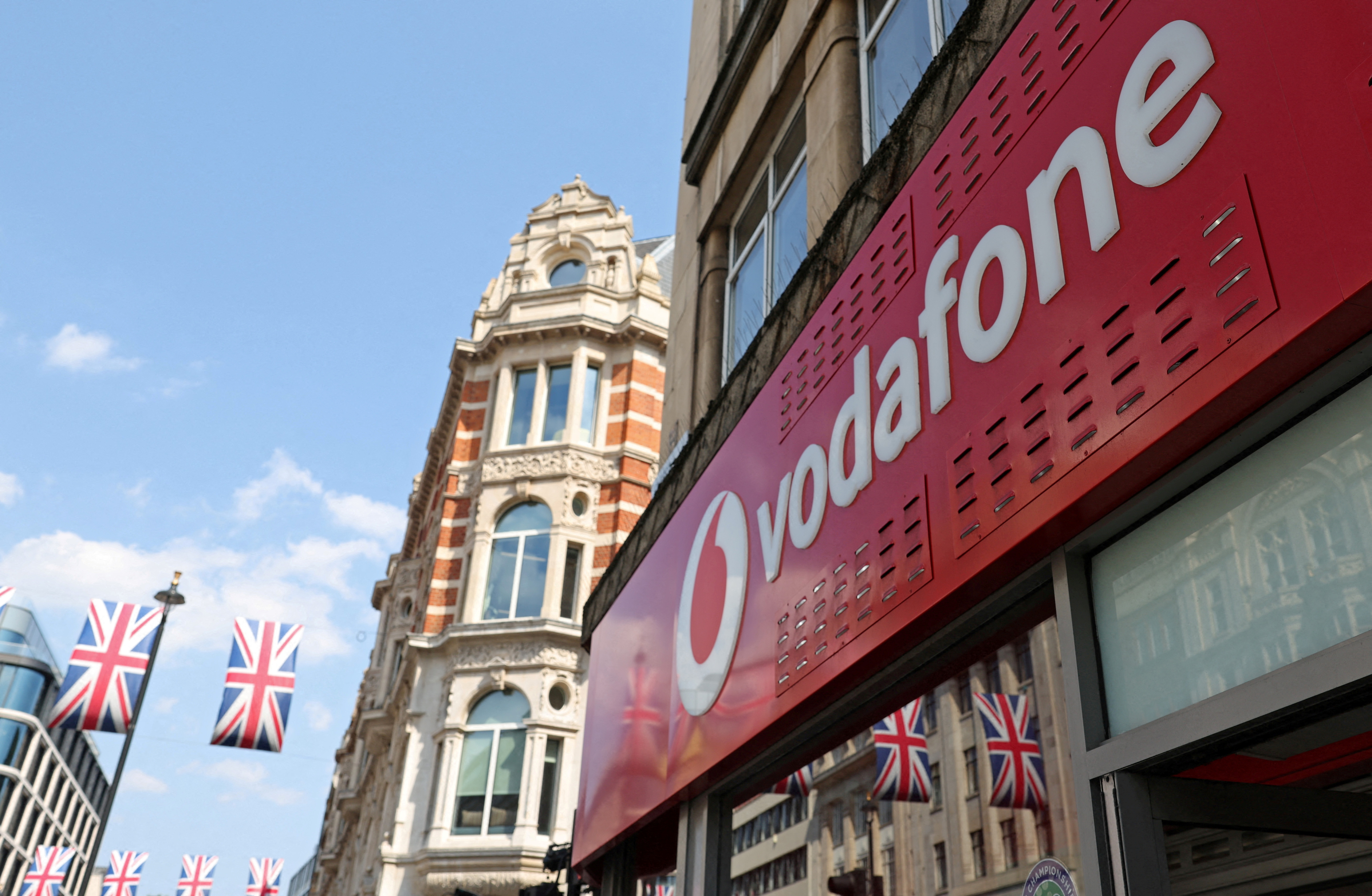 Poltics Branding is displayed for Vodafone at one in every of its stores in London