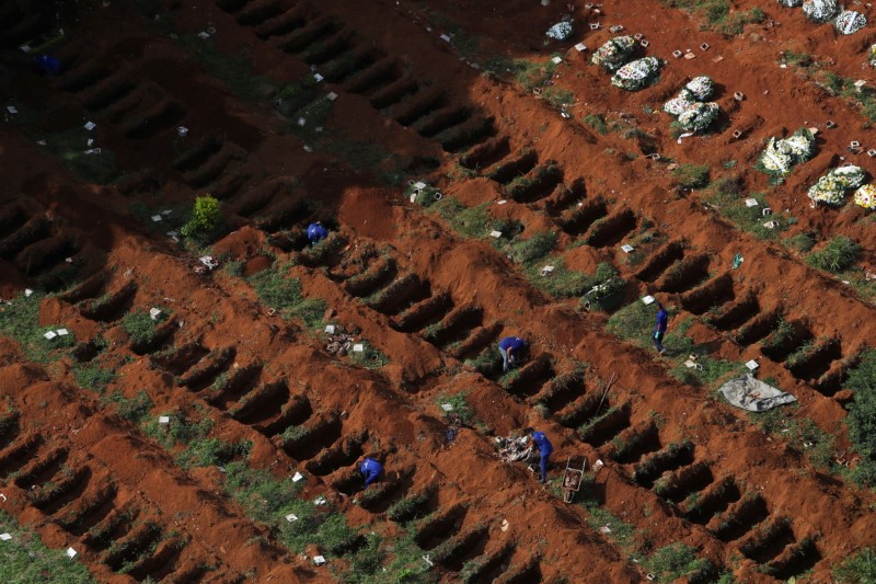 Gravediggers open new graves as the number of dead rose after the coronavirus disease (COVID-19) outbreak, at Vila Formosa cemetery, Brazil's biggest cemetery, in Sao Paulo