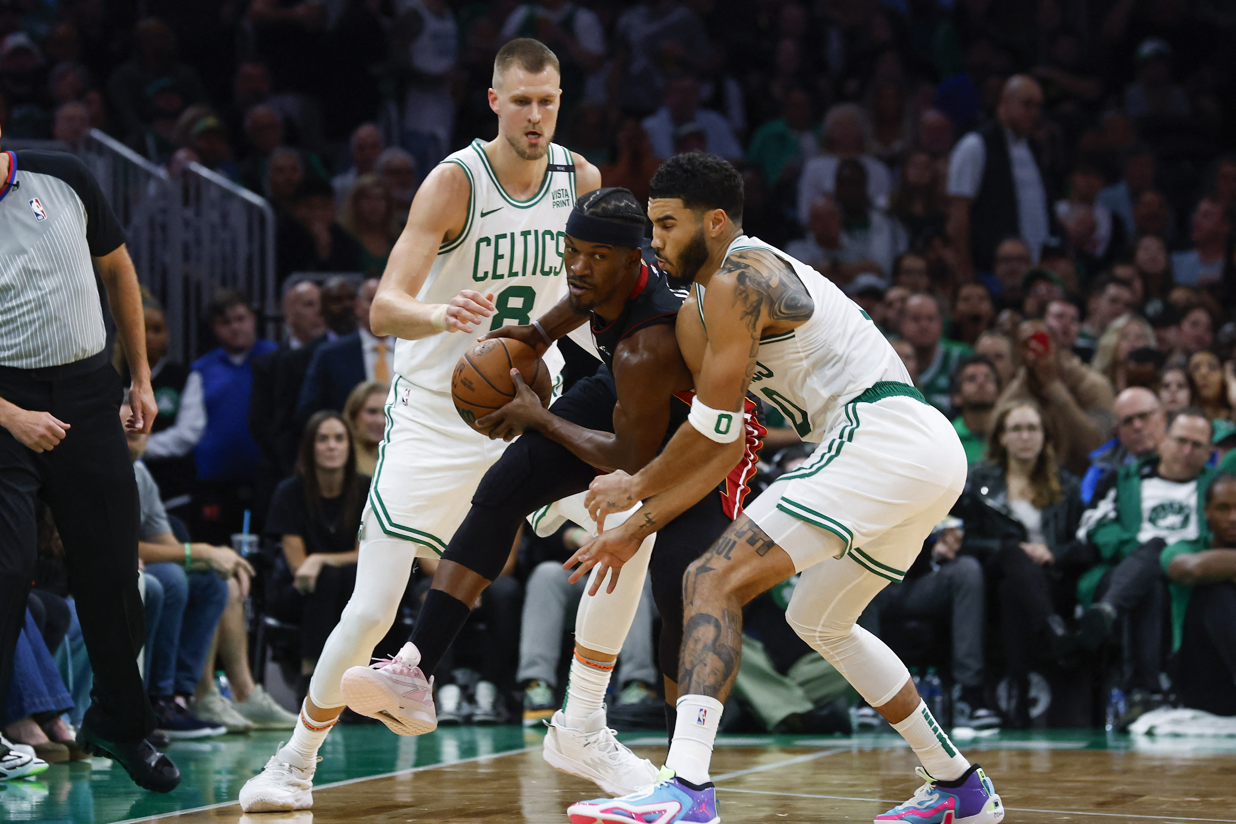 Derrick White-led Celtics take down Heat in home opener | Reuters