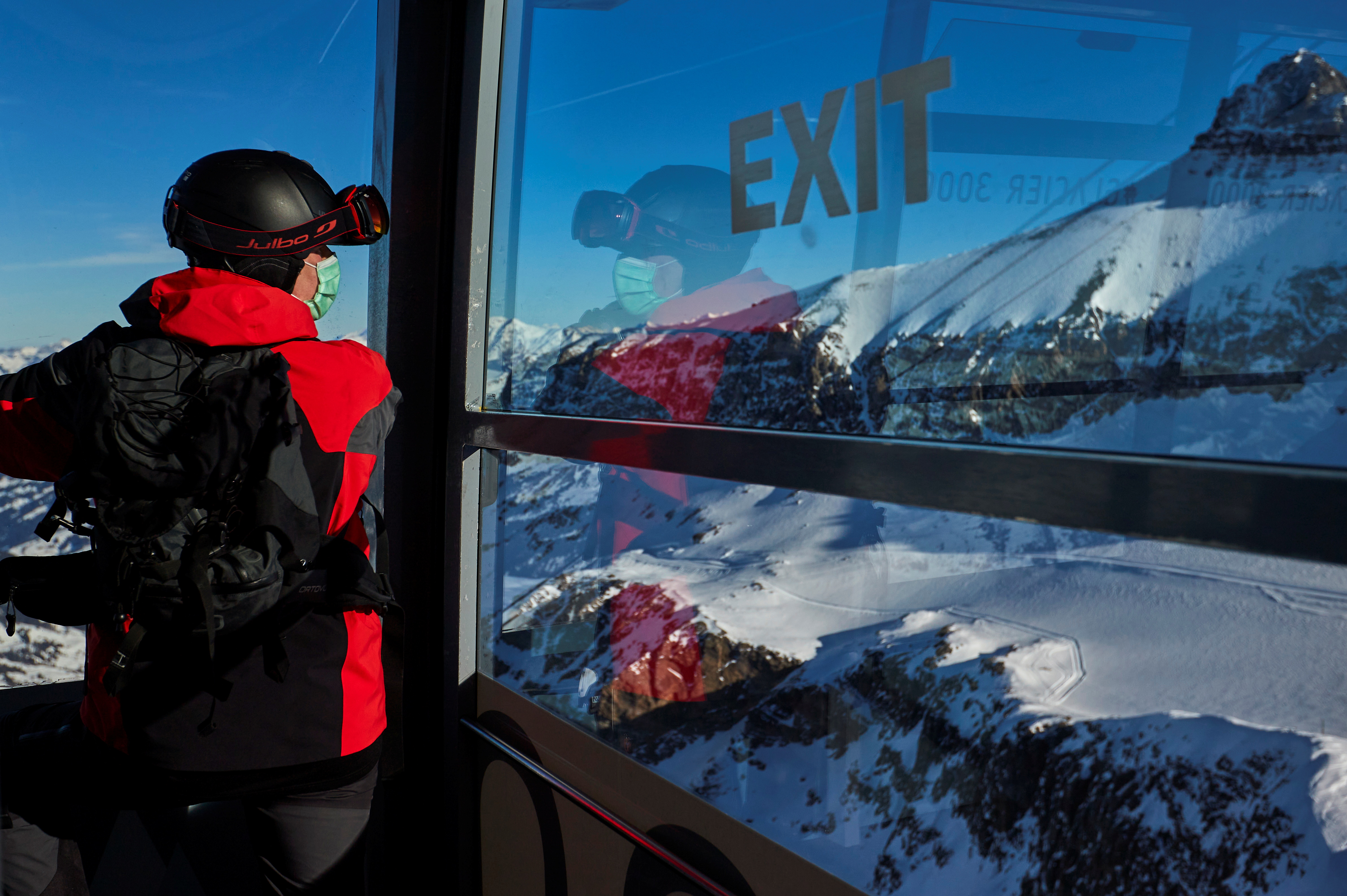 Skiers start their day amid coronavirus disease (COVID-19) pandemic at the Glacier 3000 ski resort in Les Diablerets