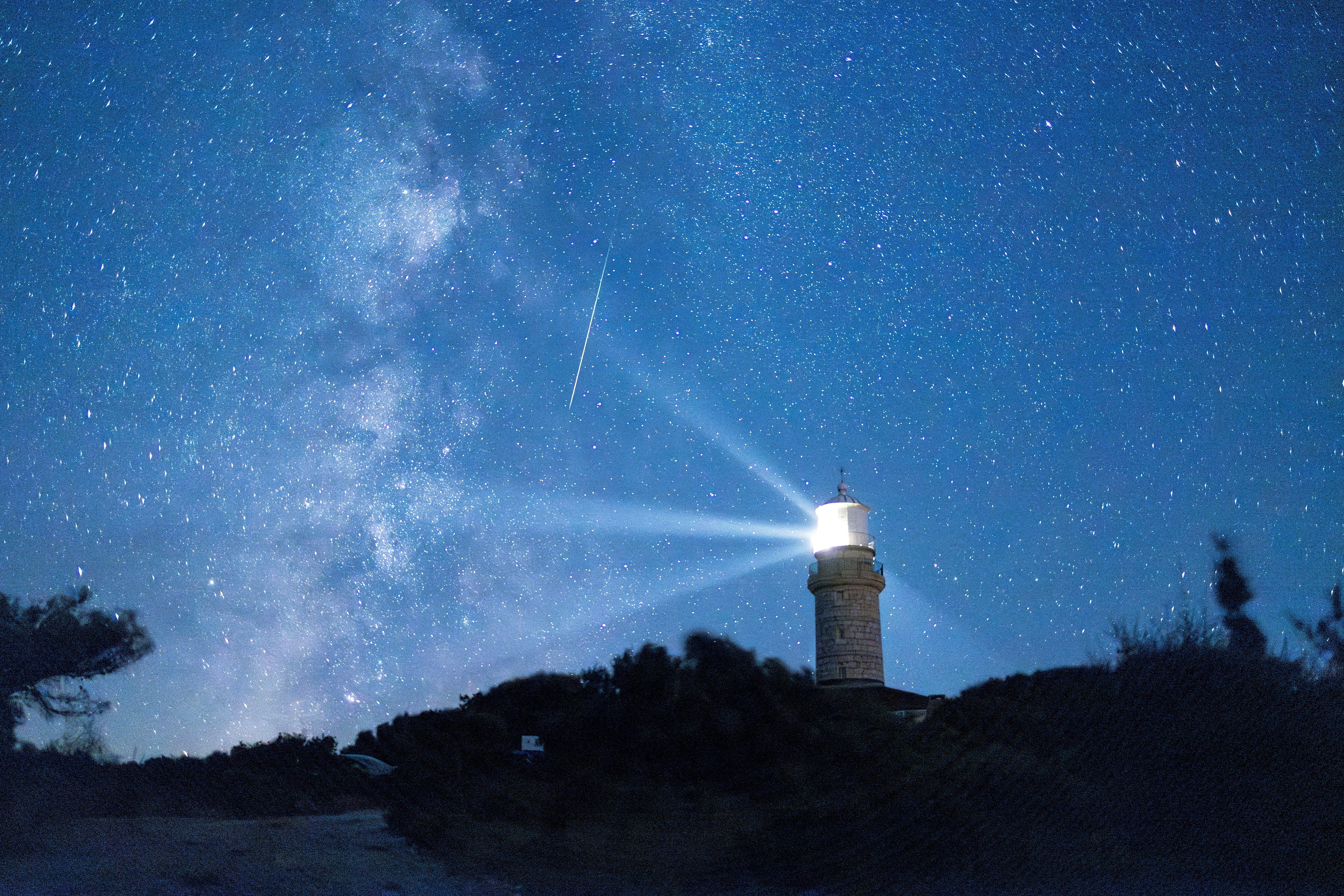 A meteor streaks in the night sky during the annual Perseid meteor shower on the island of Lastovo