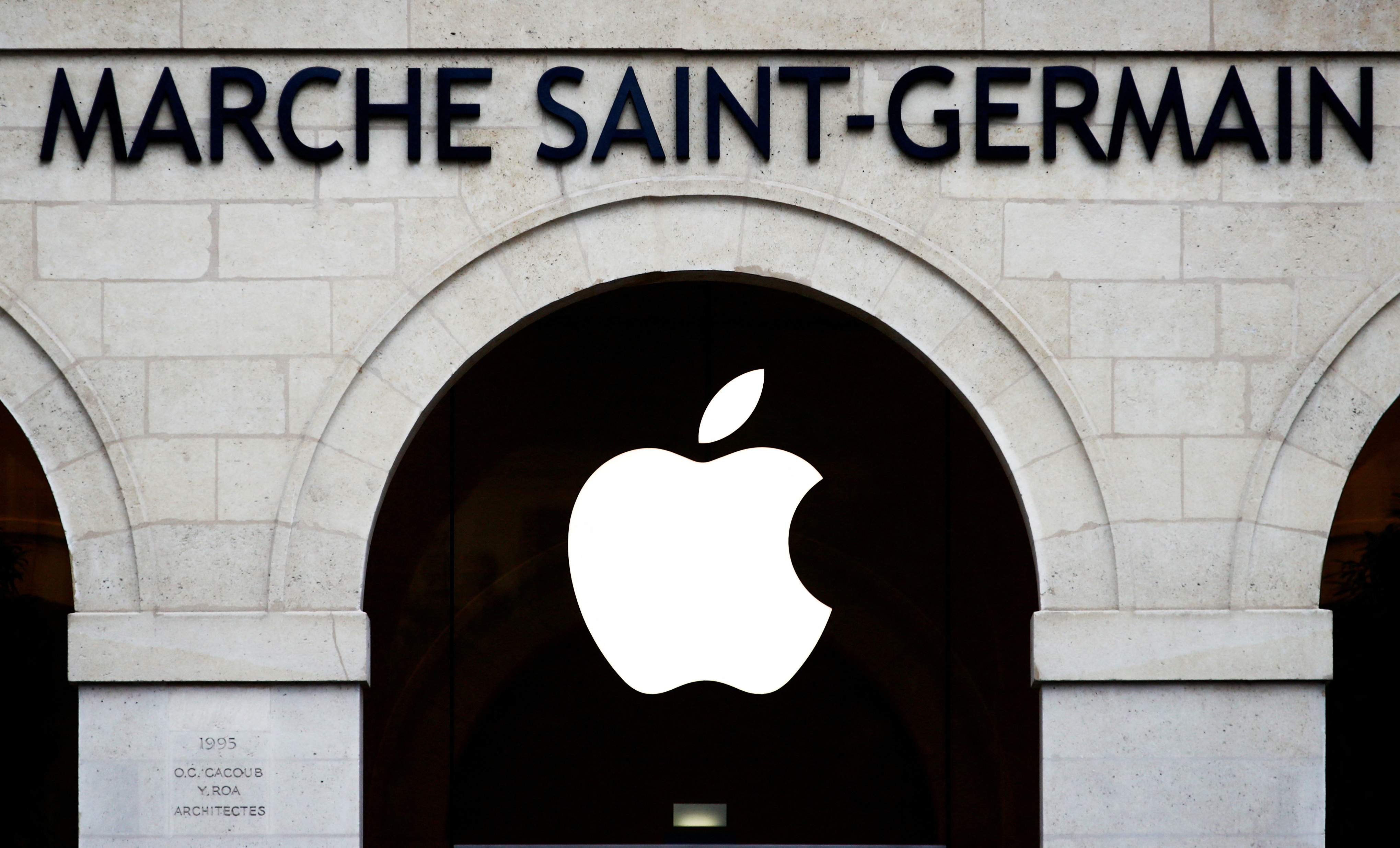 Apple logo is seen on the Apple store at The Marche Saint Germain in Paris