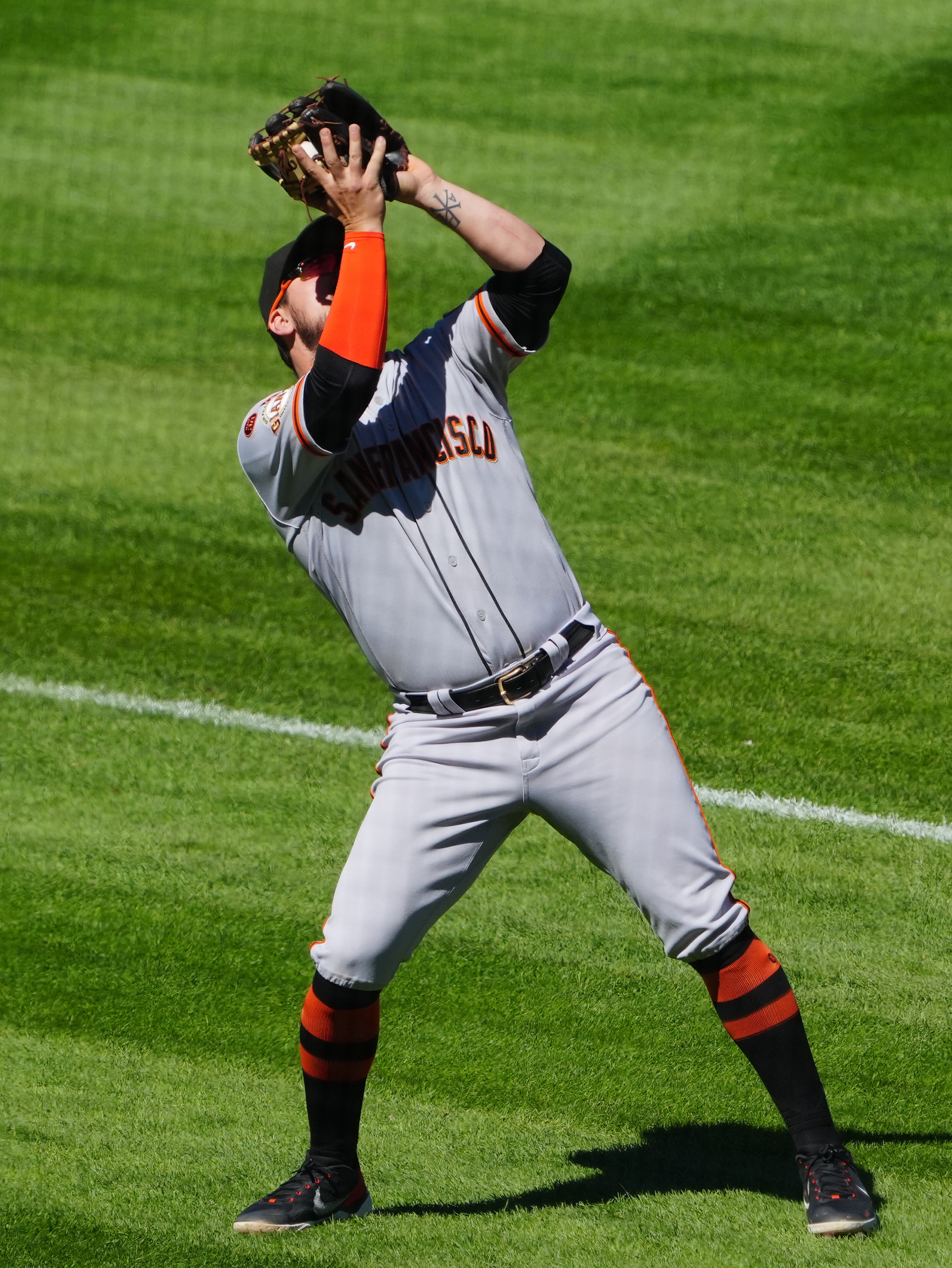 Giants outlast Rockies 11-10 despite wild finish