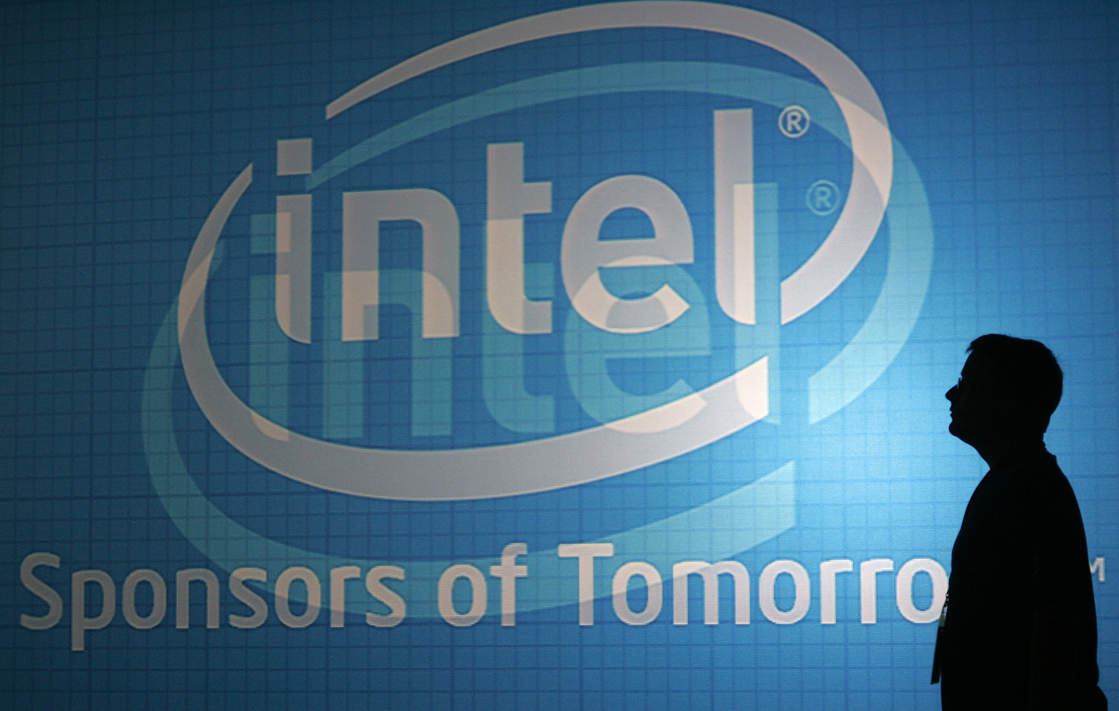 A man walks past an Intel wall at the 2009 Computex trade show in Taipei