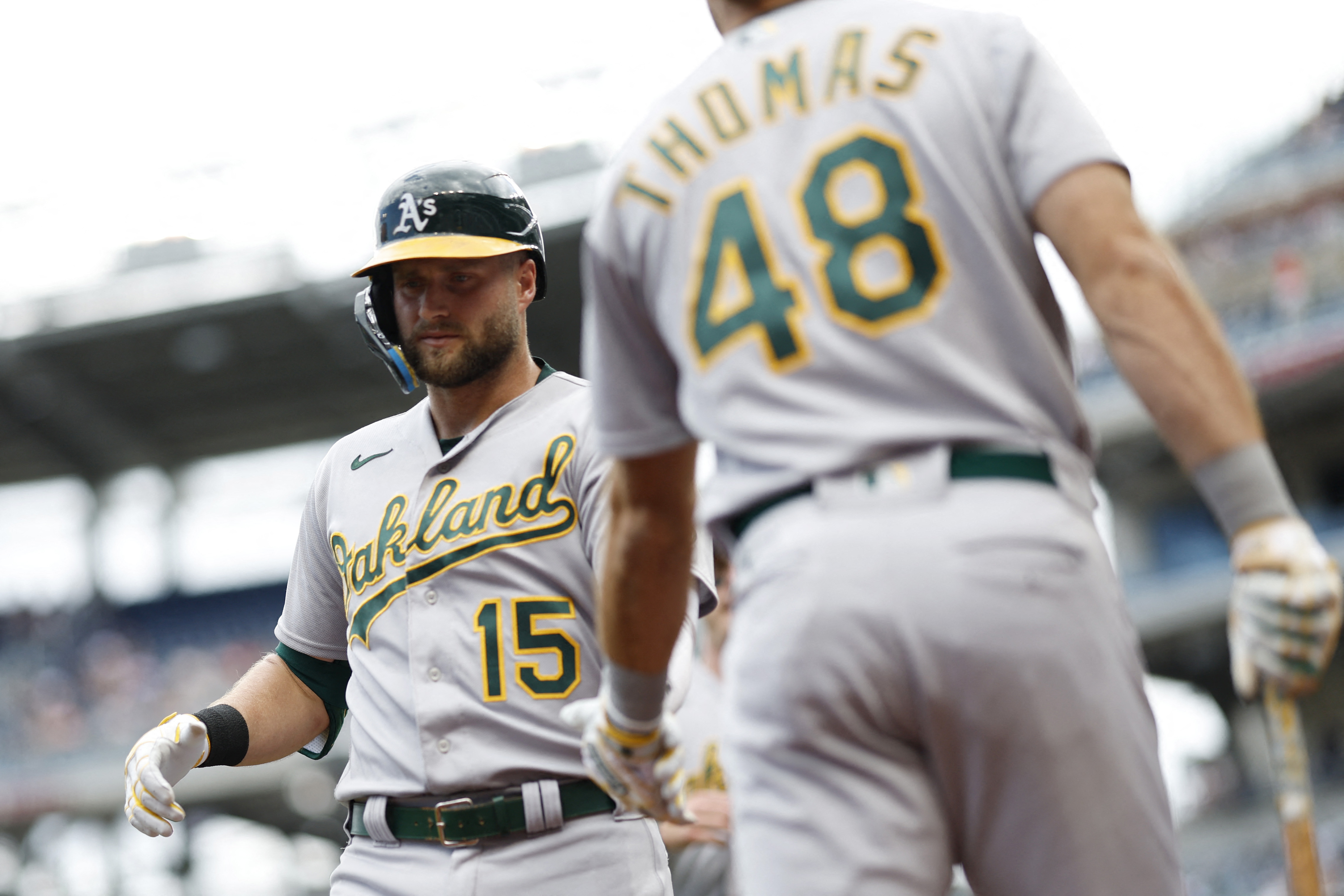 Seattle Mariners' J.P. Crawford holds a trident after hitting a solo home  run against the Oakland Athletics during the ninth inning of a baseball  game Tuesday, Sept. 19, 2023, in Oakland, Calif. (