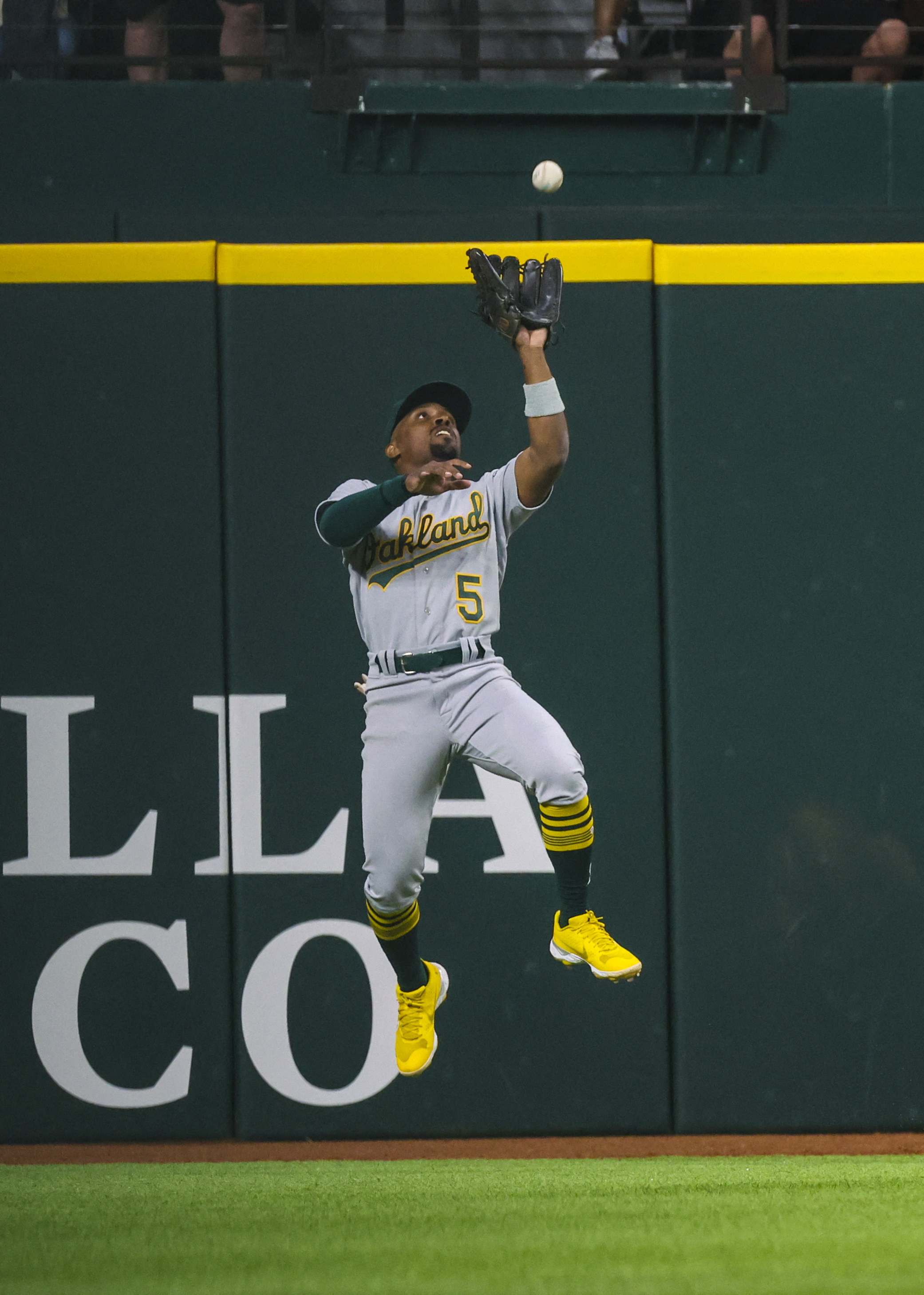 A's late rally falls short in 10-8 loss to Rangers