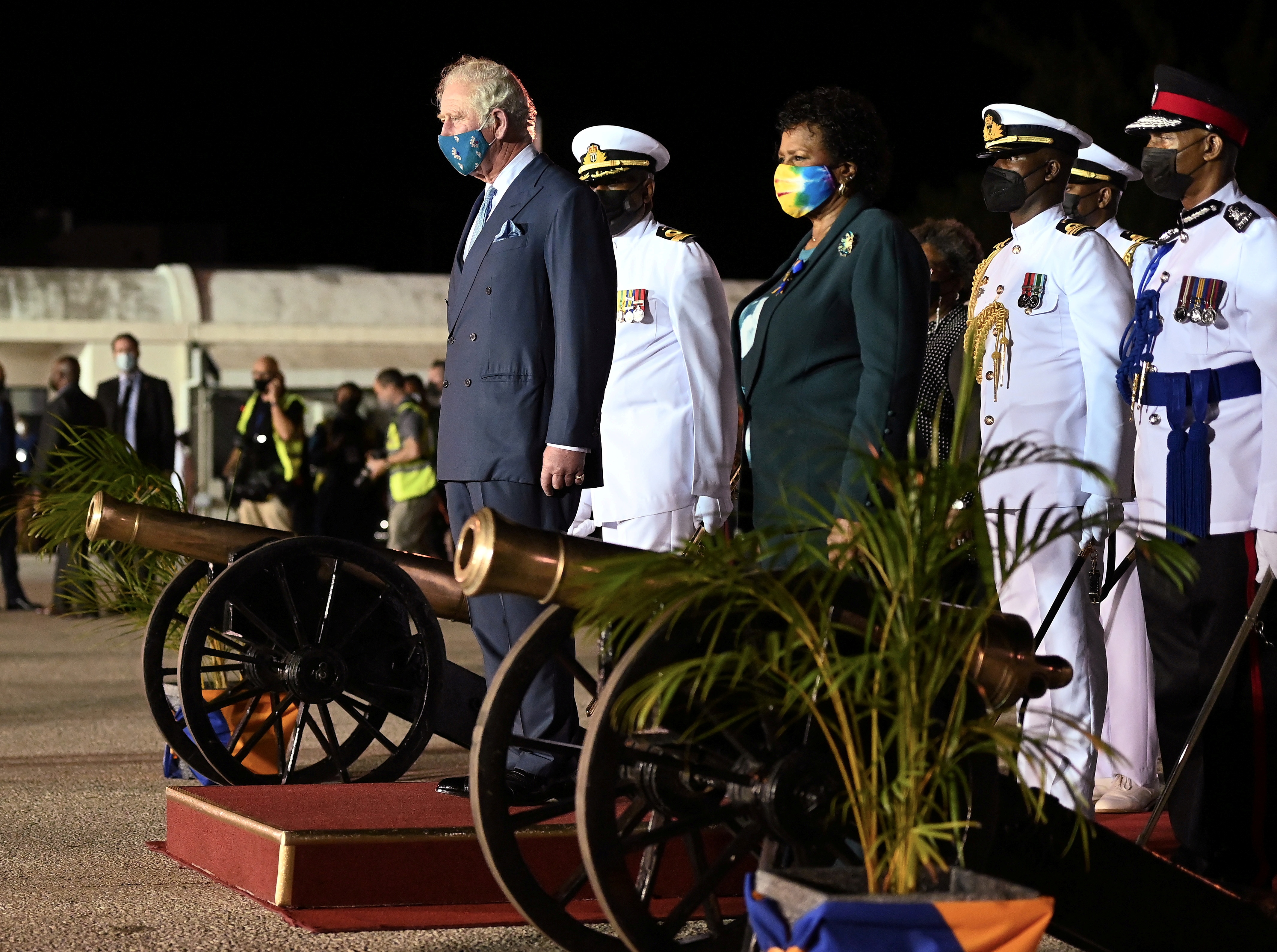 Britain's Prince Charles stands with Barbados' President-elect Sandra Mason during a Guard of Honour and playing of national anthems, as he arrives at Grantley Adams Airport, to take park in events to mark the Caribbean island's transition to a birth of a new republic, Bridgetown, Barbados, November 28, 2021. / REUTERS/Toby Melville