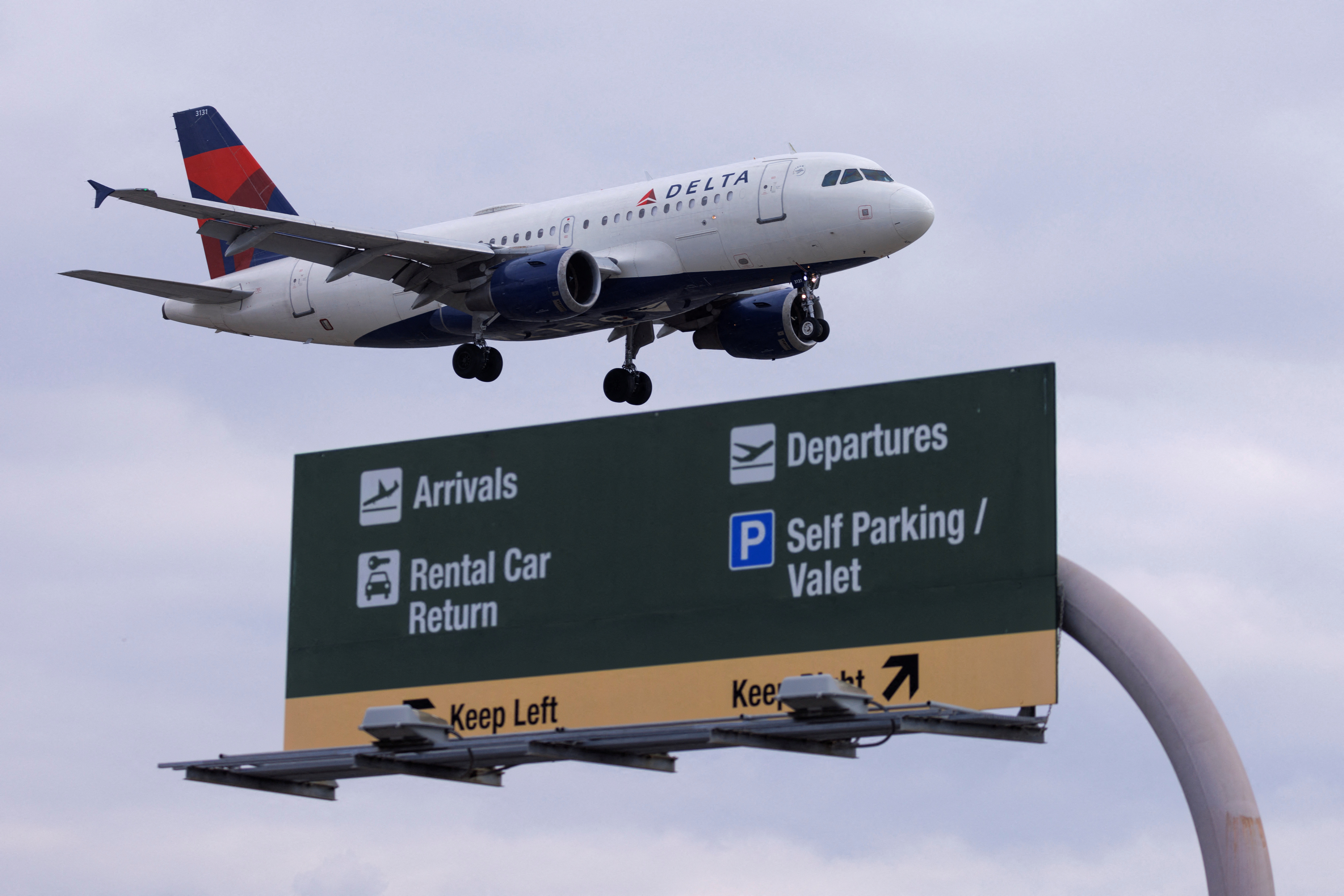 A Delta Air Lines commercial aircraft approaches to land at John Wayne airport in Santa Ana, California