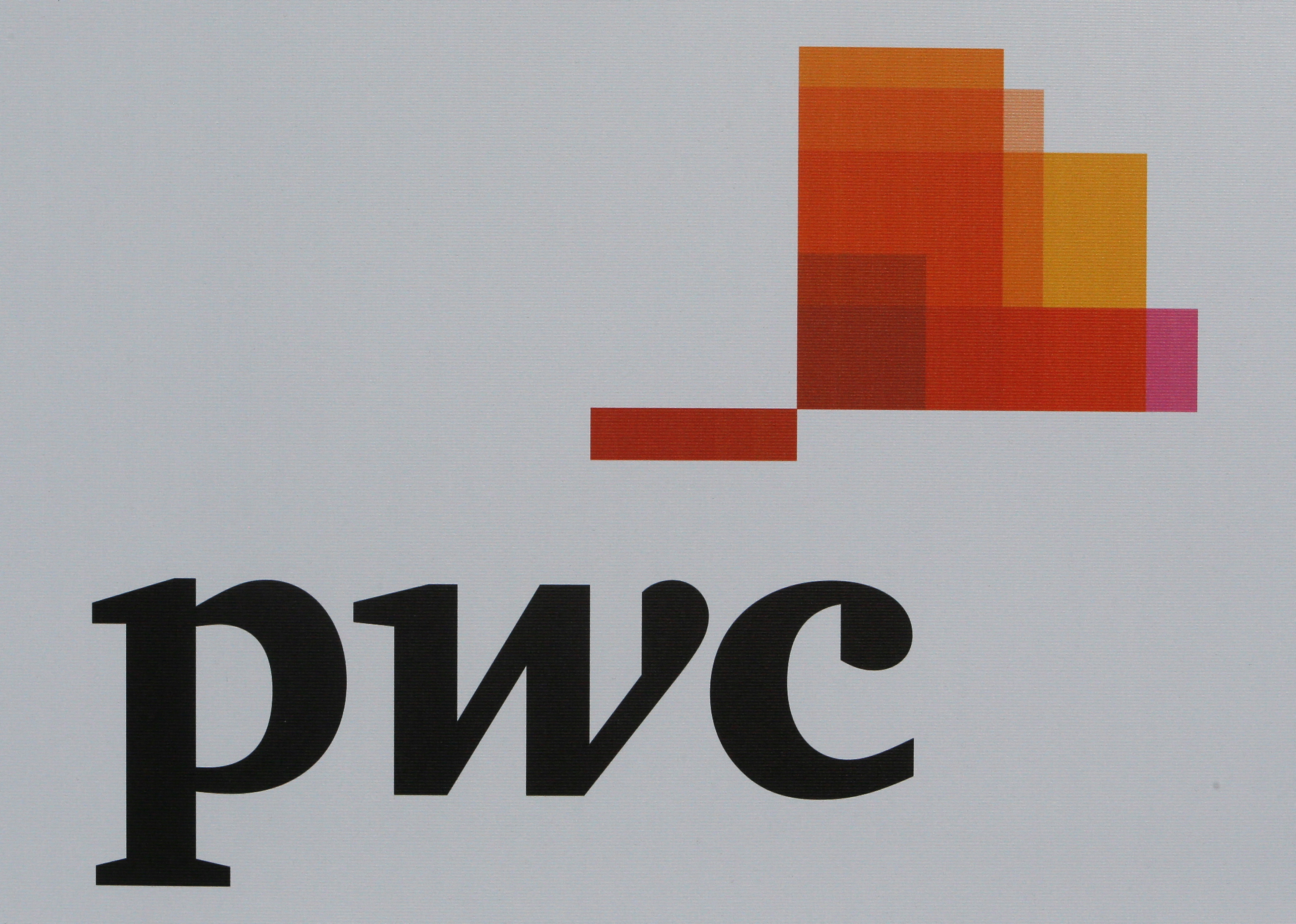The logo of accounting firm PwC is seen on a board at the SPIEF 2017 in St. Petersburg