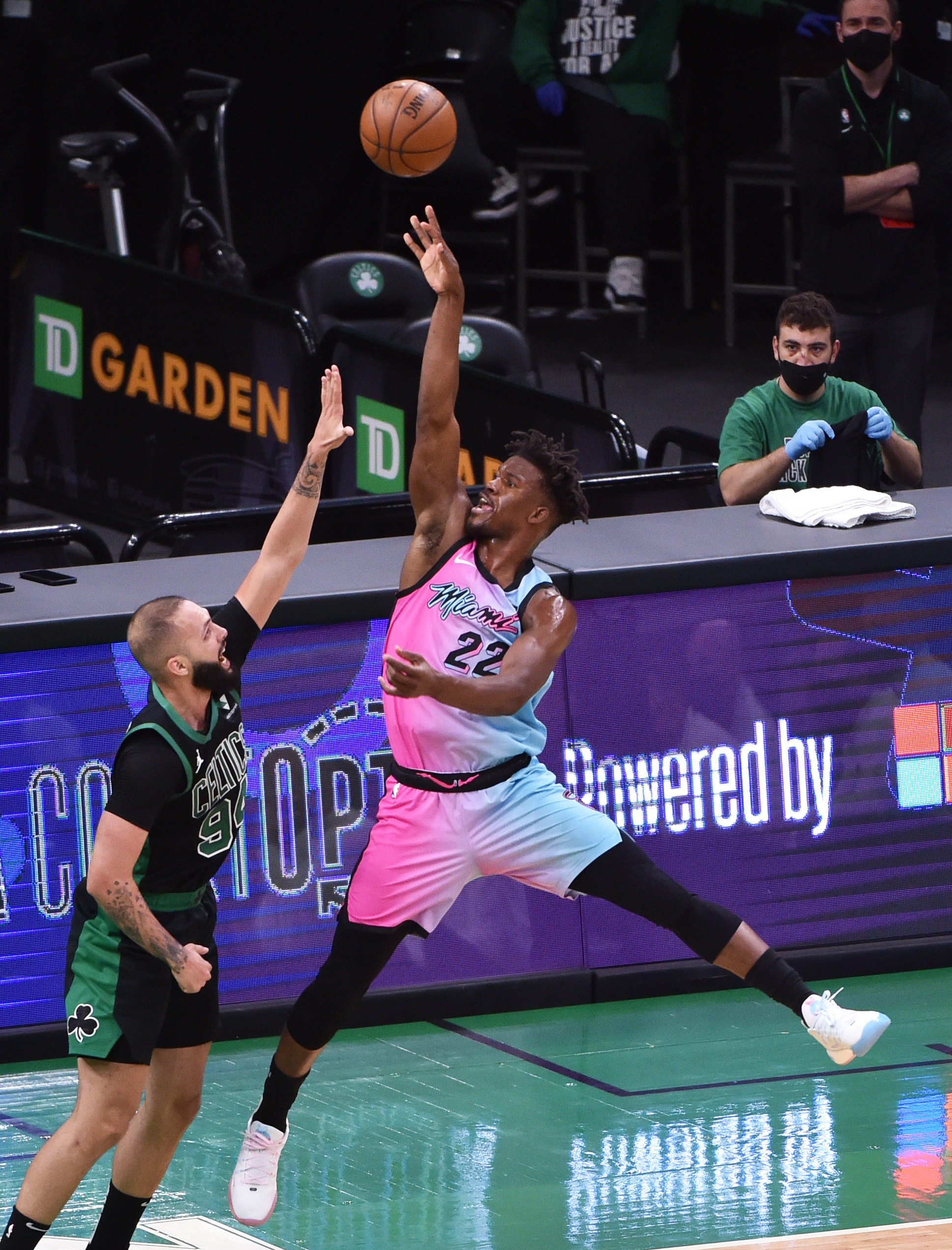 May 9, 2021; Boston, Massachusetts, USA; Miami Heat forward Jimmy Butler (22) shoots the ball over Boston Celtics guard Evan Fournier (94) during the second half at TD Garden. Mandatory Credit: Bob DeChiara-USA TODAY Sports