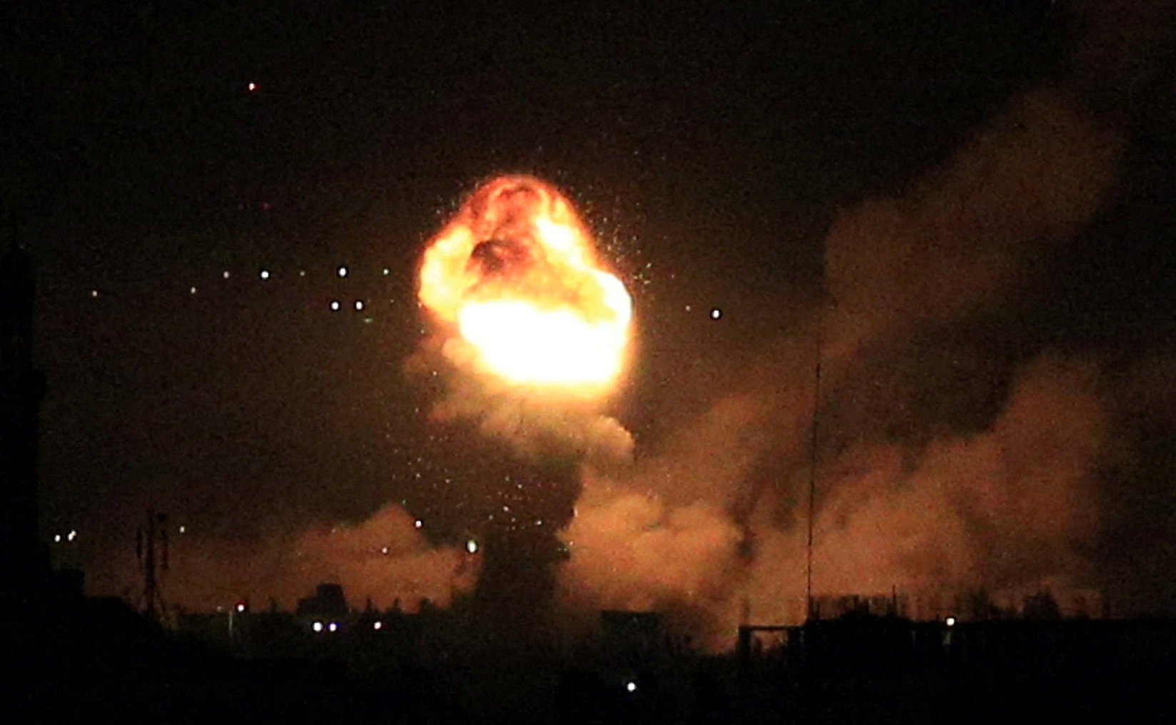 Smoke and flames rise during Israeli airstrikes in Gaza