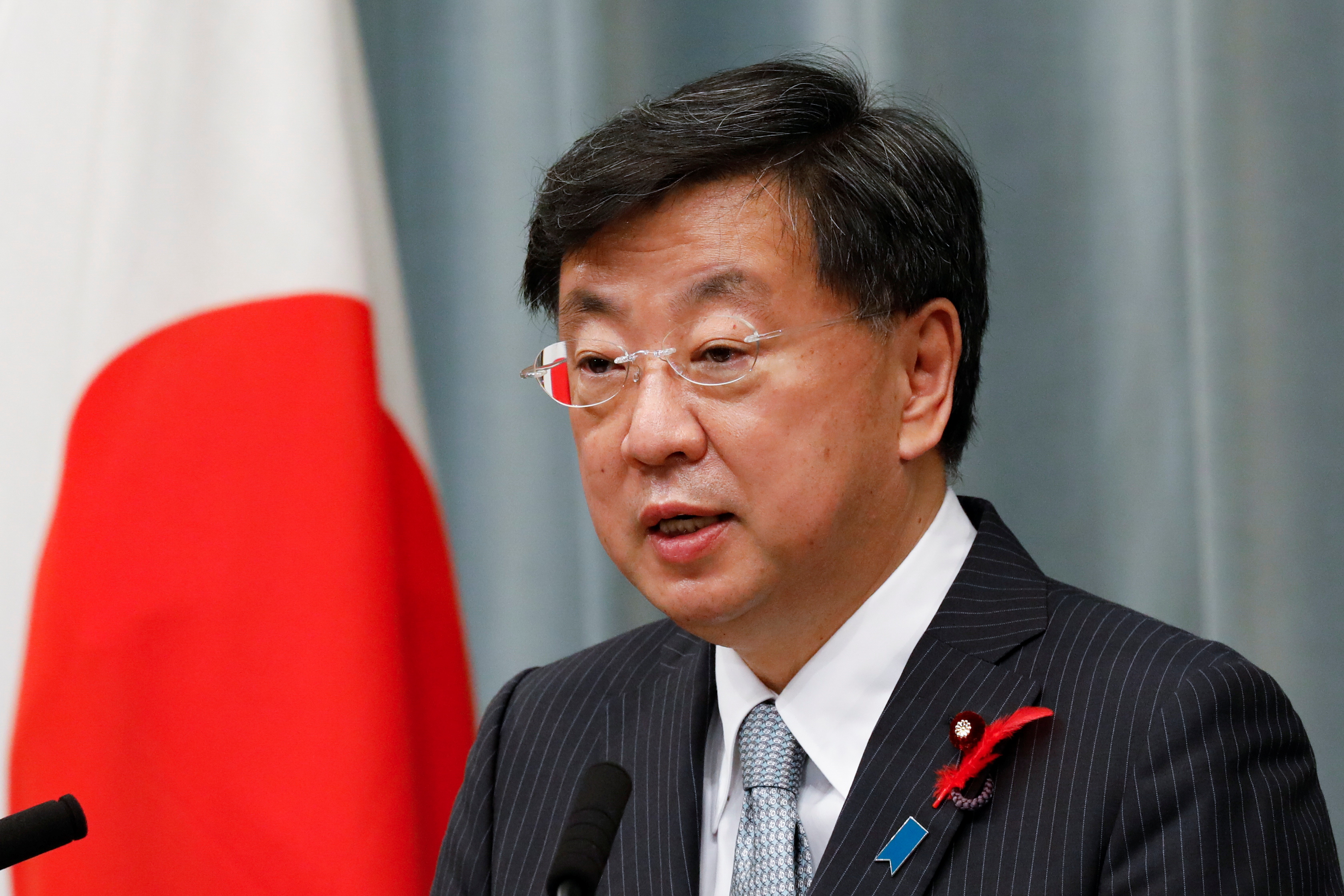 Japan's new Chief of Cabinet Secretary Matsuno Hirokazu announces new cabinet members, in Tokyo