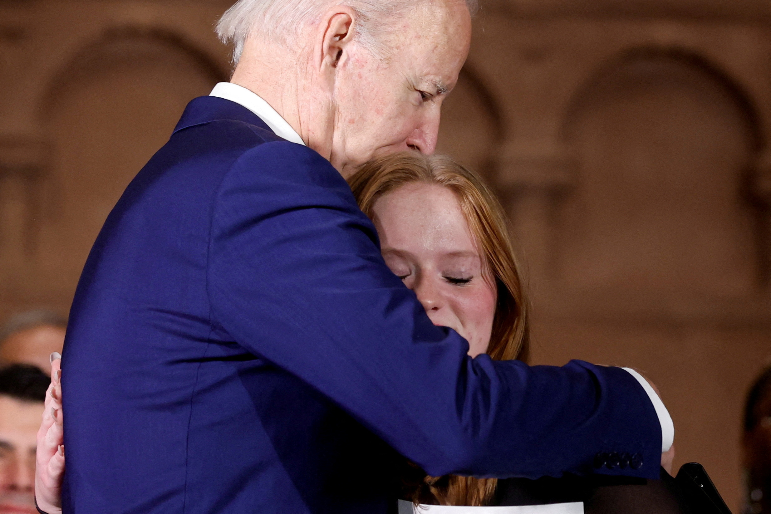 Biden meets families of mass shooting victims, toughens gun rules | Reuters