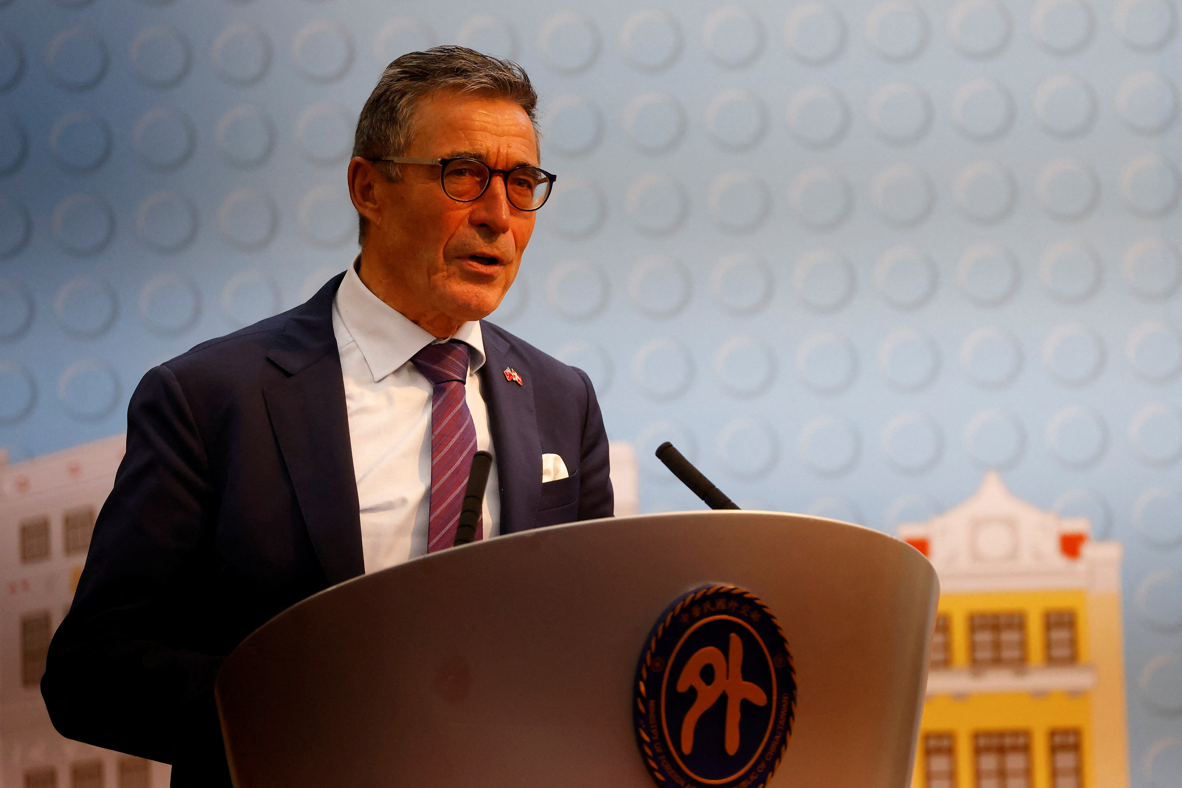 Former NATO Secretary-General Anders Fogh Rasmussen speaks to the media at a press event in Taipei