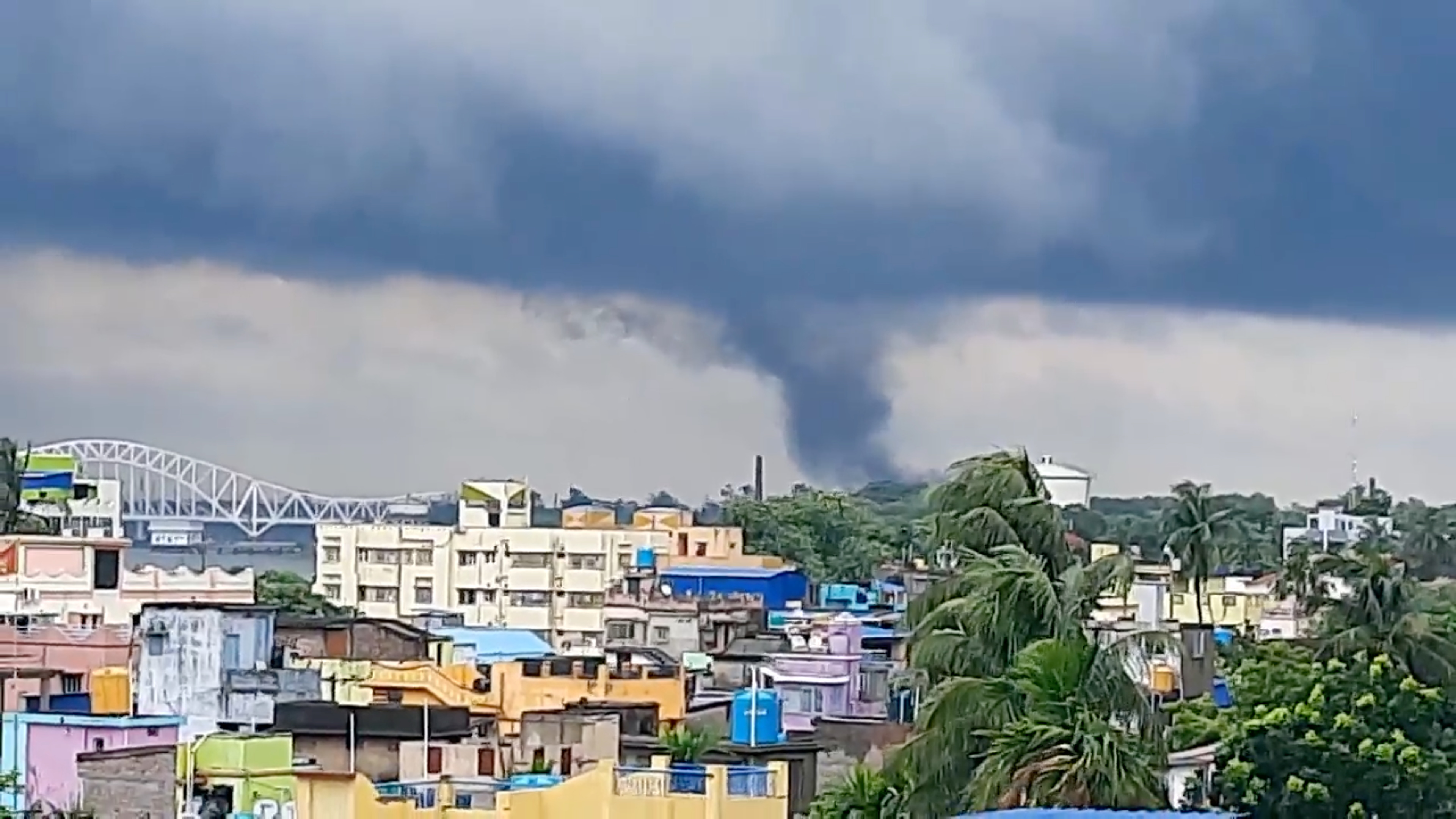 A tornado is seen approaching as Cyclone Yaas continues to move inland, in Naihati
