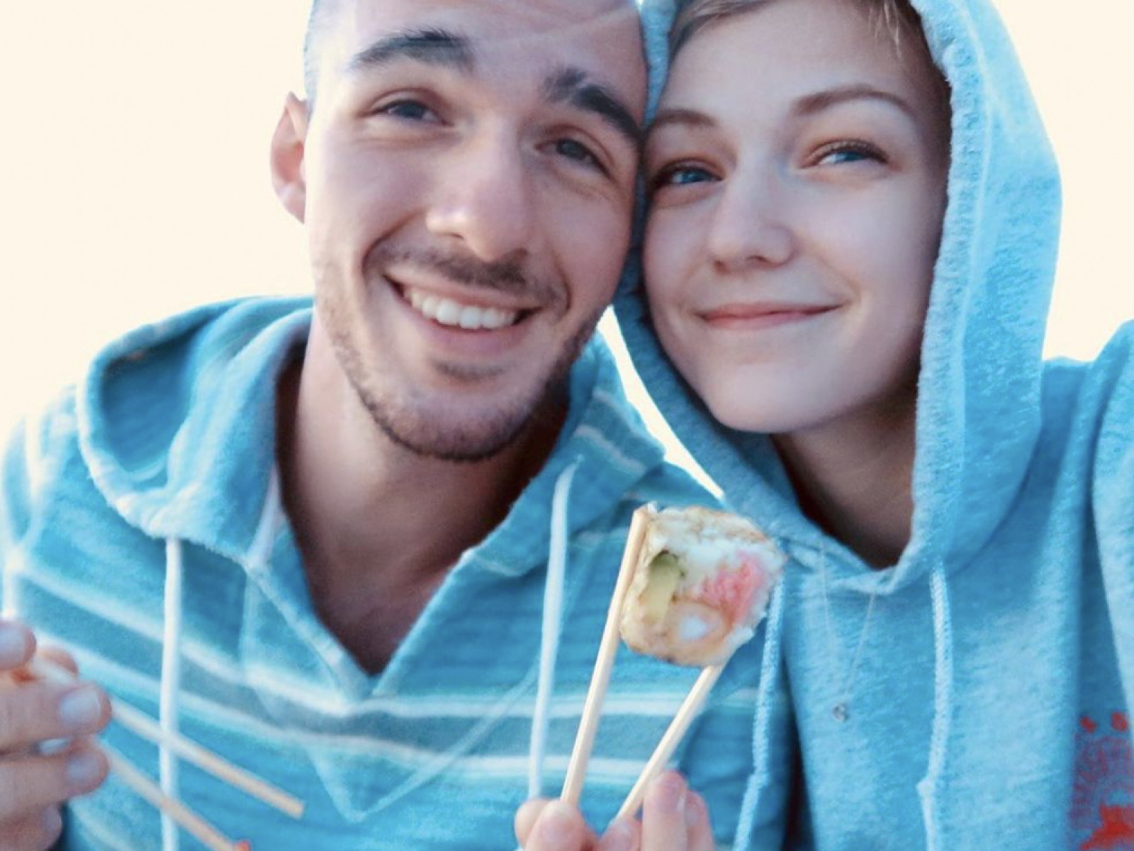 Gabrielle Petito, 22, who was reported missing on Sept. 11, 2021 after traveling with her boyfriend around the country in a van and never returned home, poses for a photo with Brian Laundrie in this undated handout photo.  North Port/Florida Police/Handout via REUTERS/