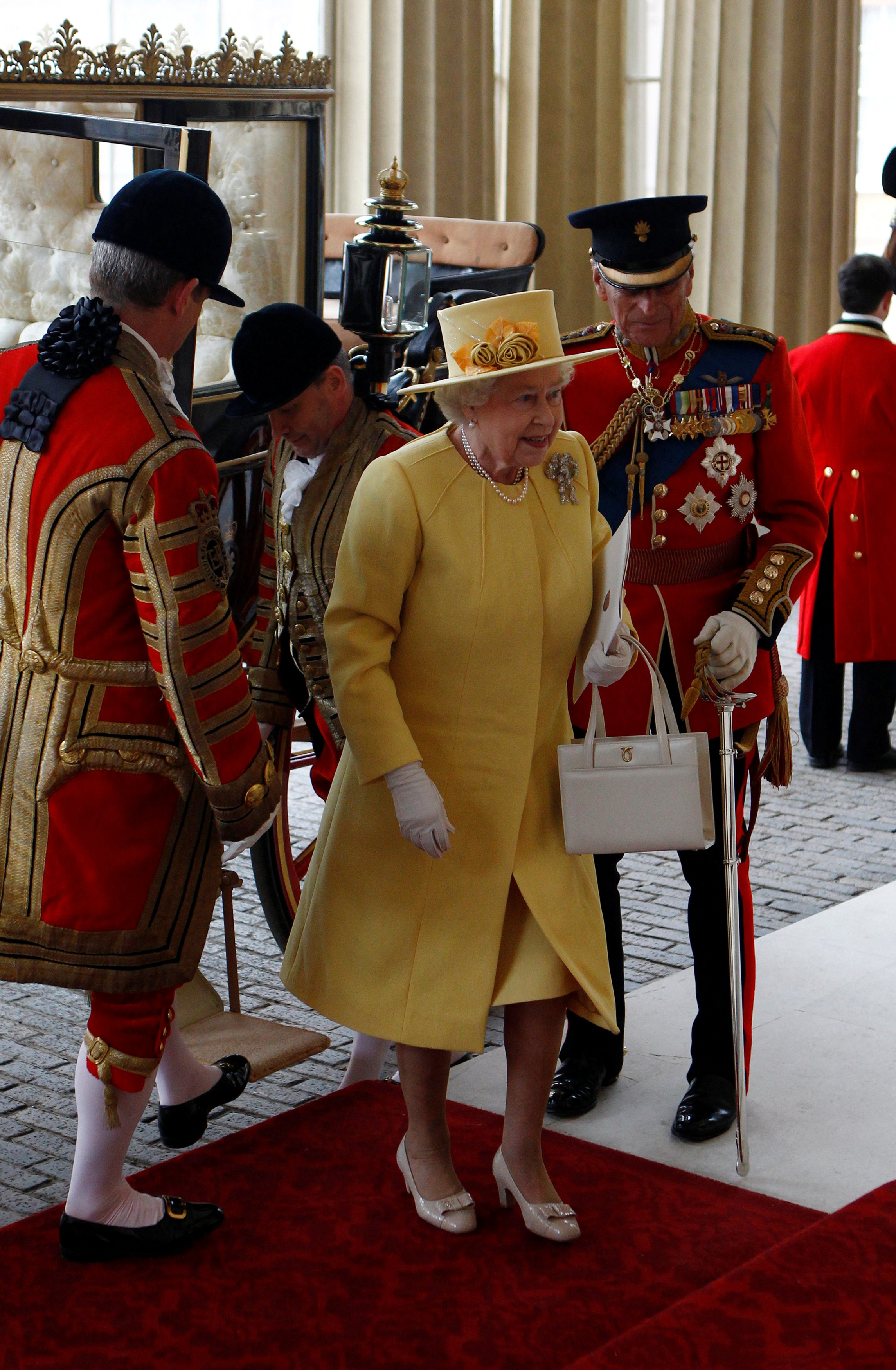 Britain's Queen Elizabeth arrives at Buckingham Palace after the wedding ceremony of Britain's Prince William and Catherine, Duchess of Cambridge, in central London