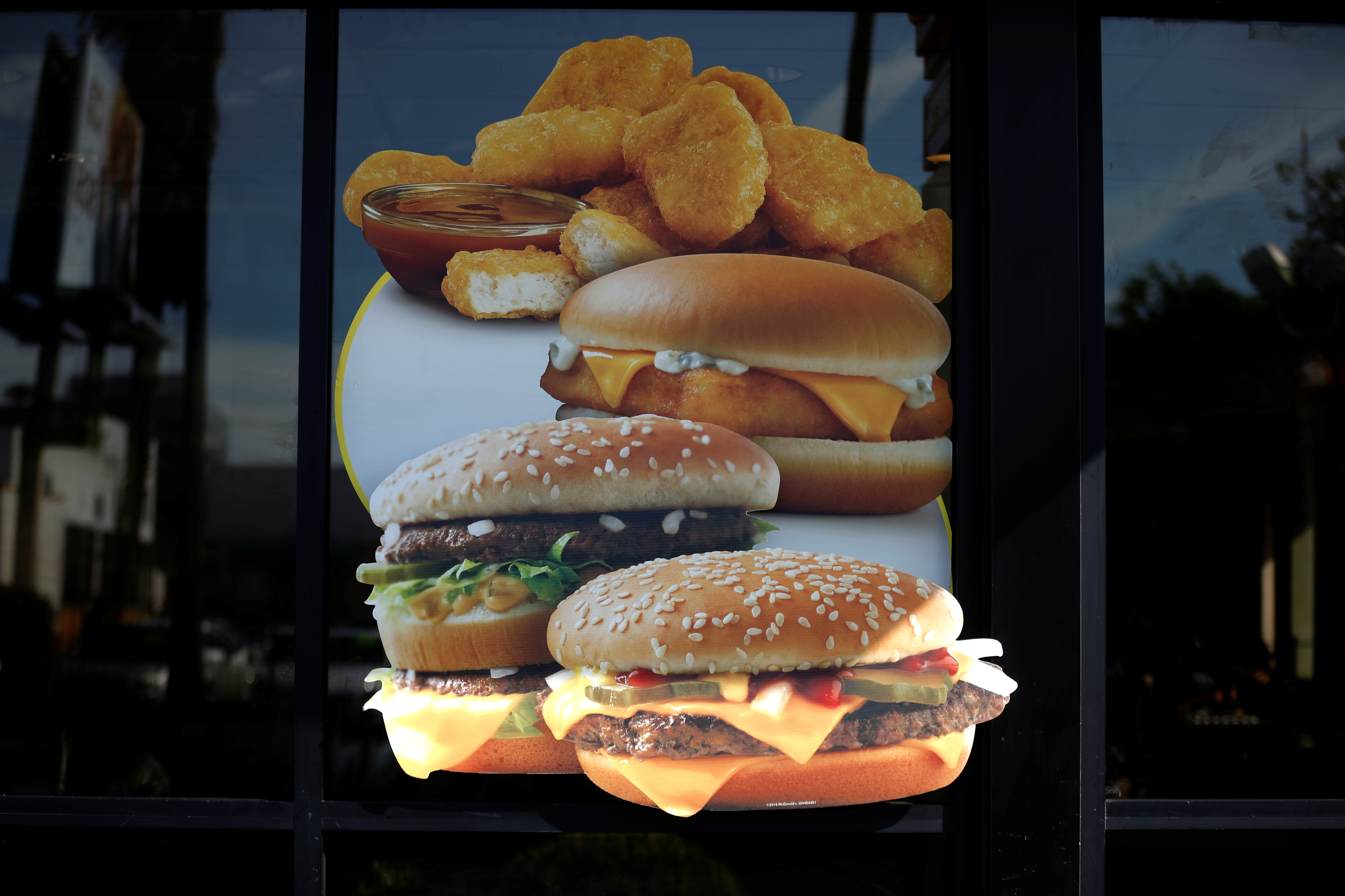 The window of Dow Jones Industrial Average stock market index listed company McDonald's (MCD) is seen in Los Angeles