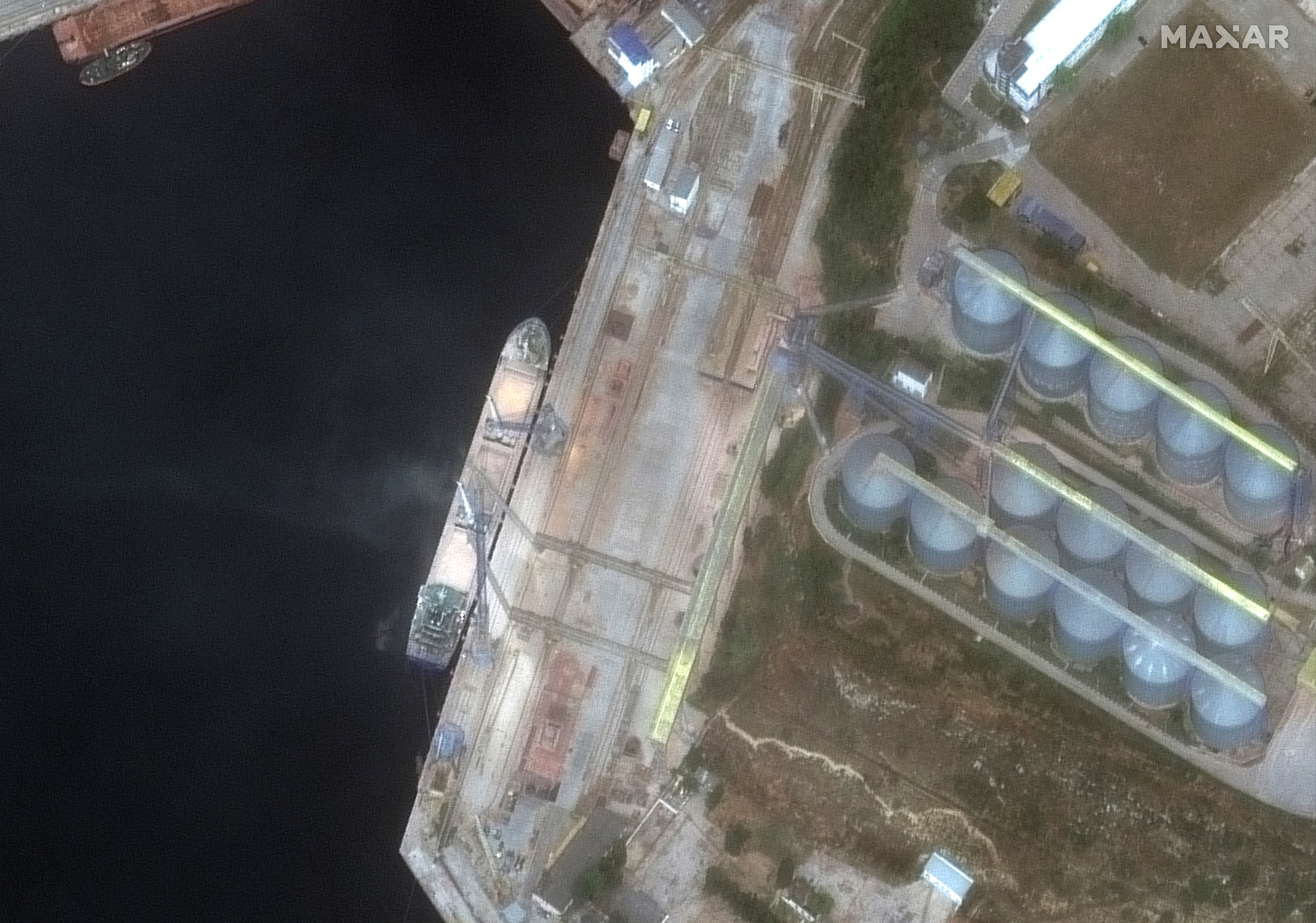 Satellite image shows a view of a ship loading grain, in Sevastopol