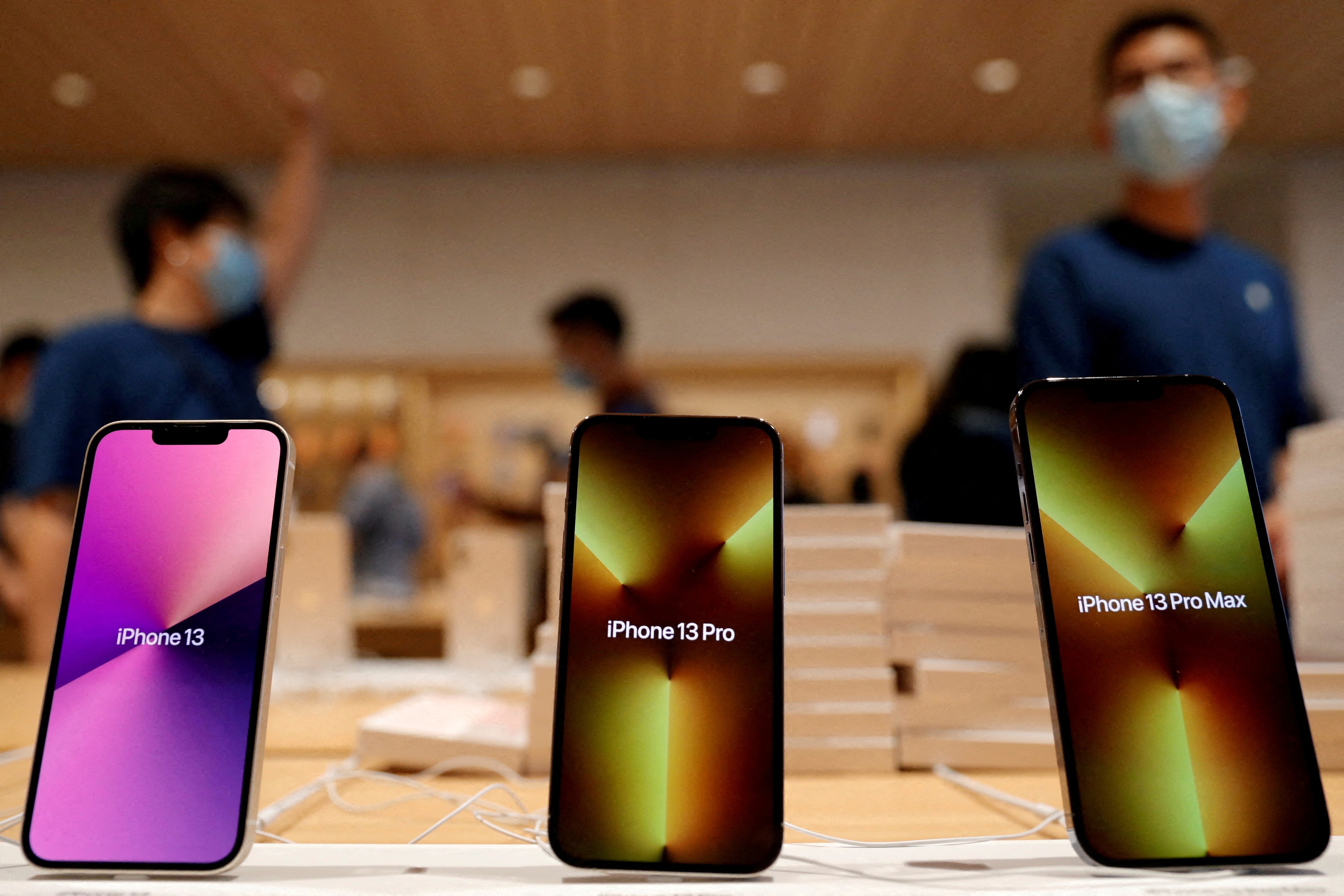Apple's iPhone 13 models are pictured at an Apple Store in Beijing