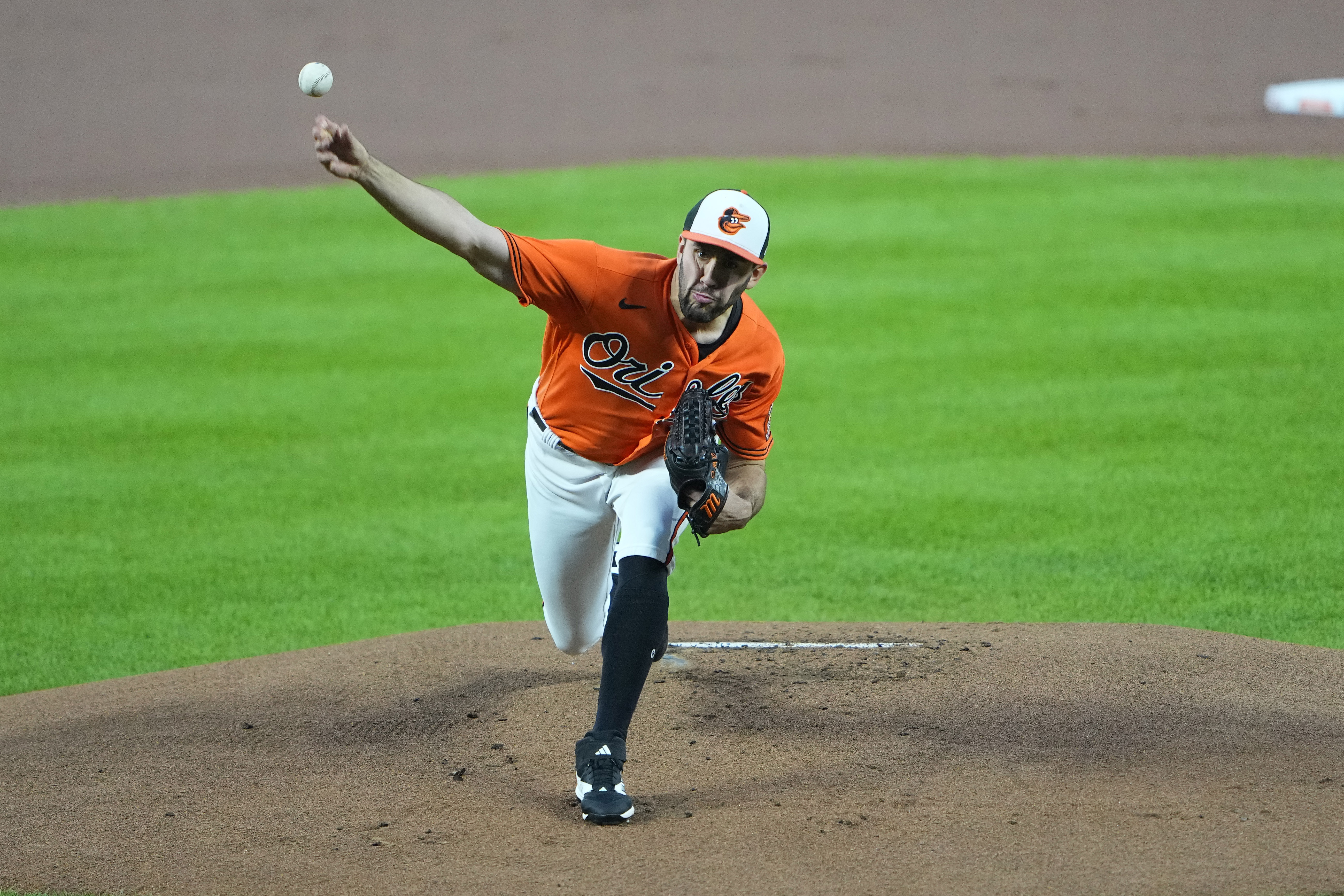 Baltimore Orioles second baseman Adam Frazier (12) safely reaches third  base after a wild pitch was thrown in the bottom of the second inning  against the Tampa Bay Rays at Oriole Park