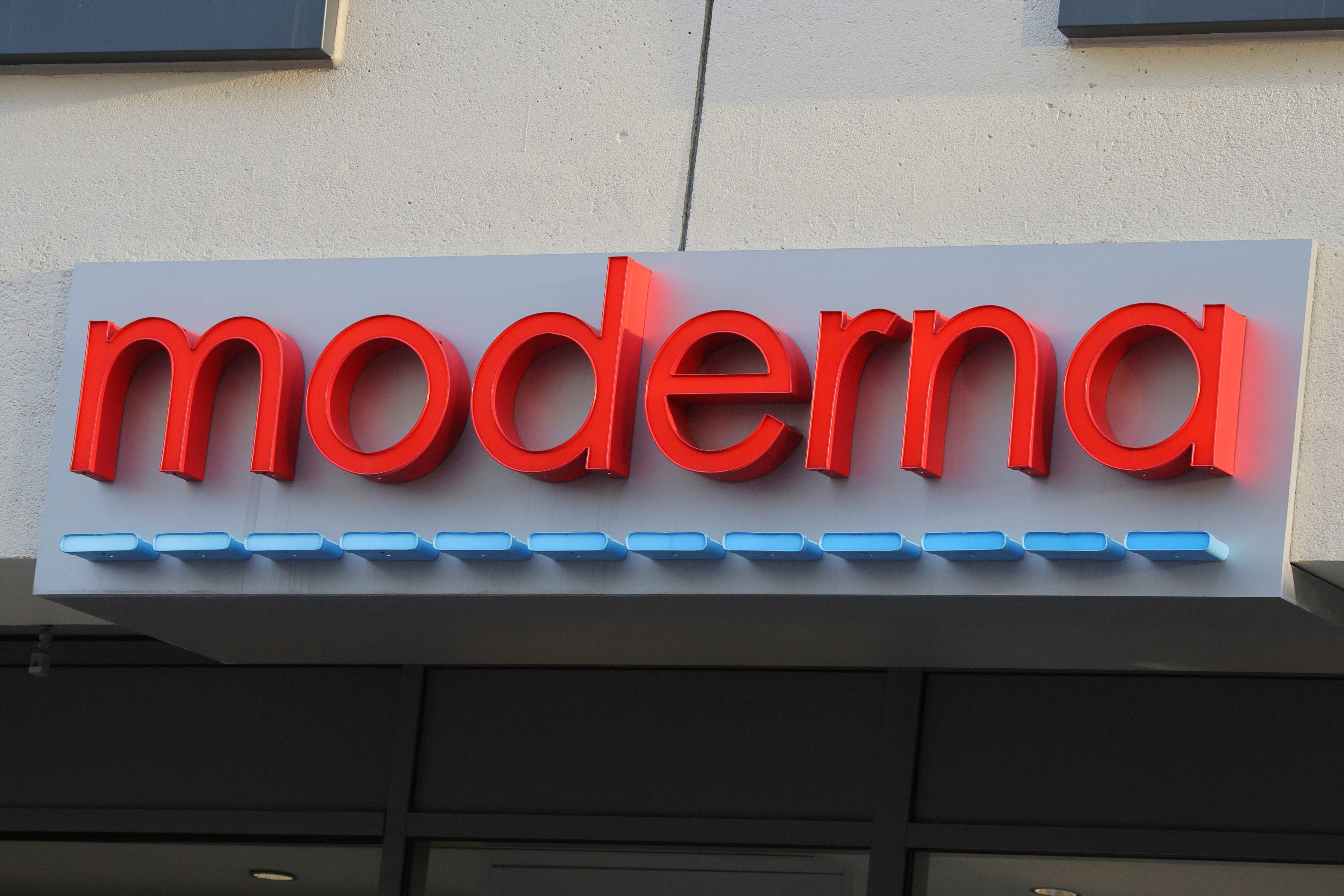 A sign marks the headquarters of Moderna in Cambridge