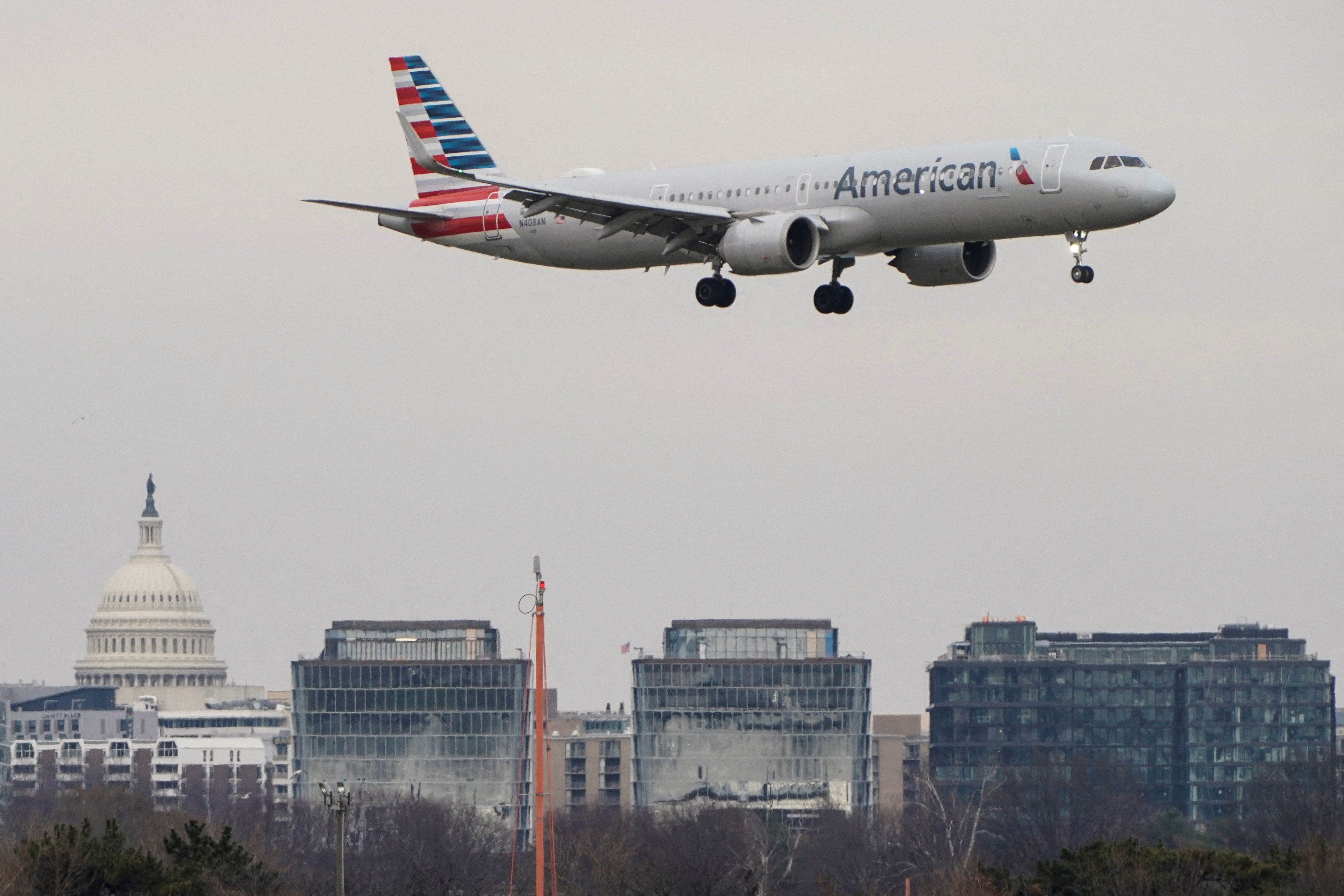 An American Airlines aircraft lands at Reagan National Airport in Arlington, Virginia
