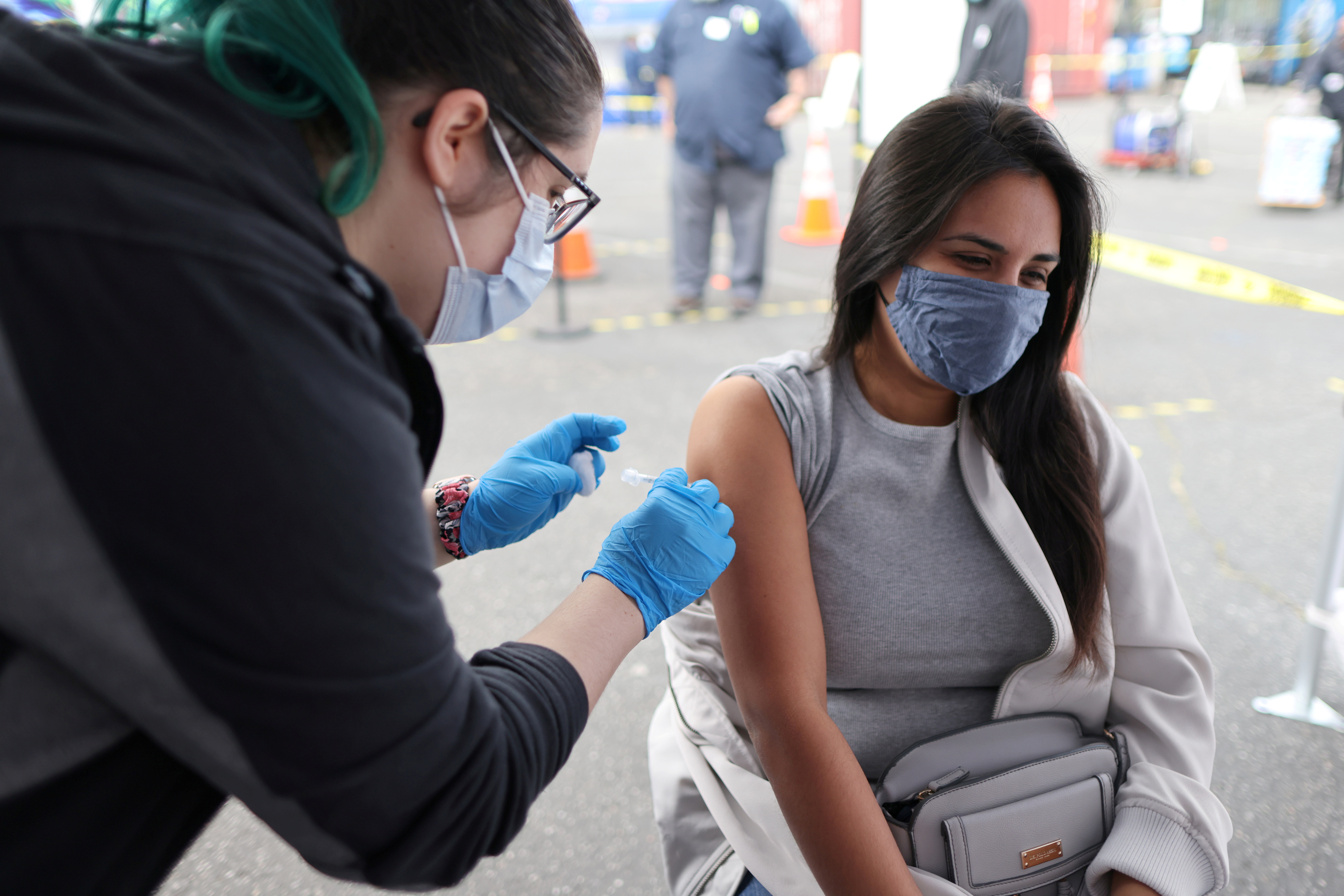Esperanza Guevara, 31, receives a Johnson & Johnson coronavirus disease (COVID-19) vaccination, in Los Angeles