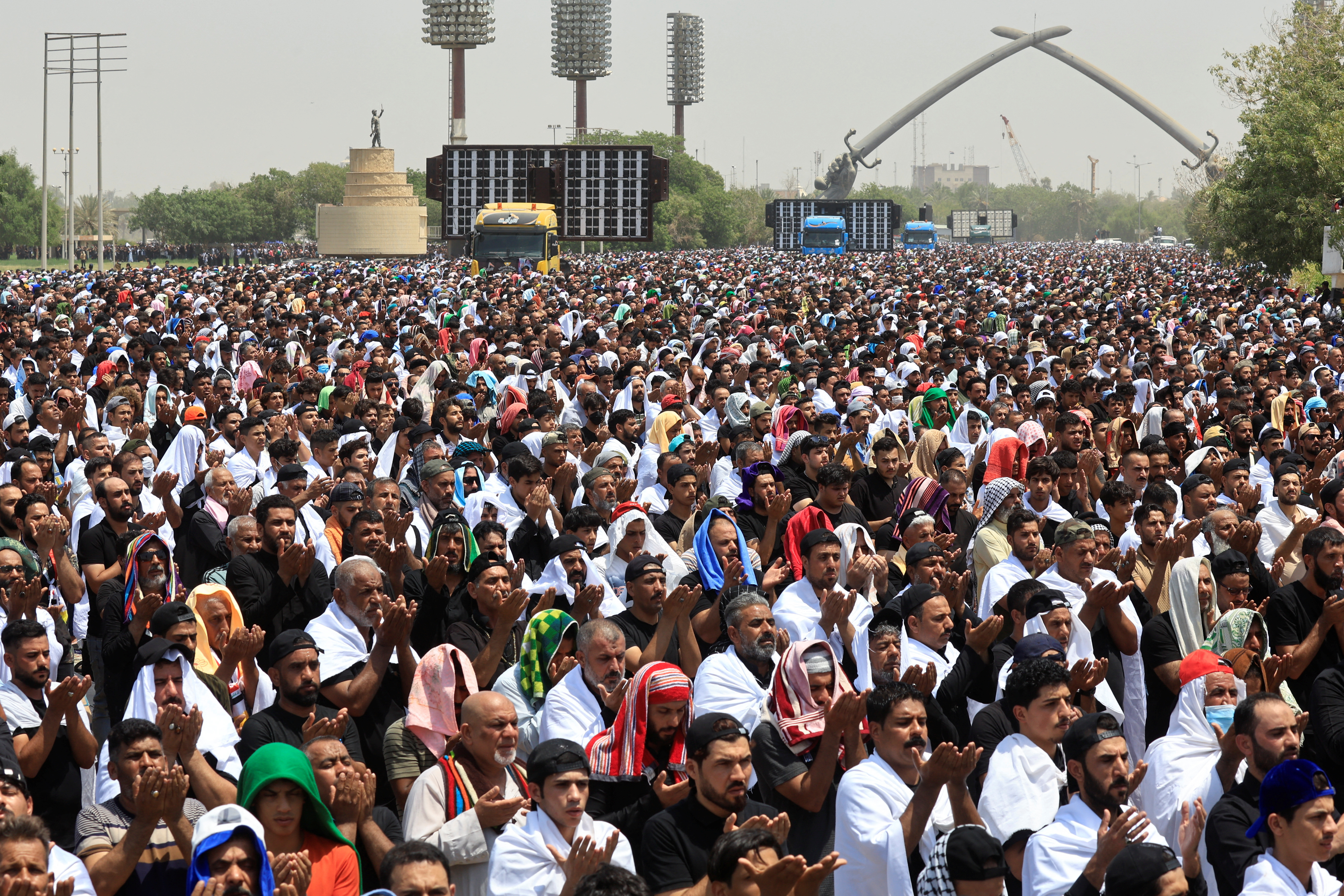 Supporters of Iraqi populist leader Moqtada al-Sadr gather for mass Friday prayer, in Baghdad