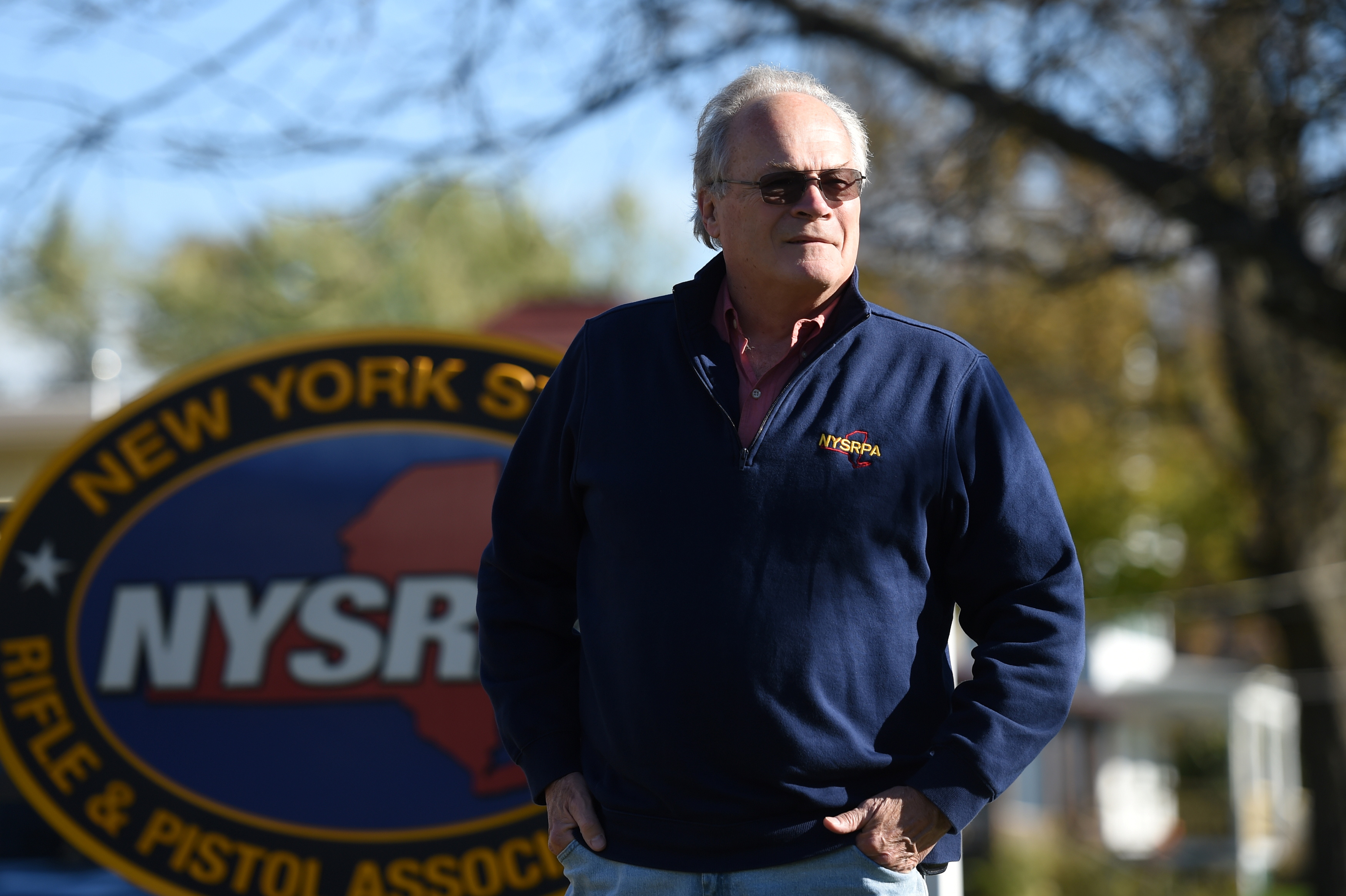 Tom King, head of the New York State Rifle and Pistol Association (NYSRPA), and a challenger in a case being heard by the U.S. Supreme Court with regards to the right to carry handguns in public, poses at the NYSRPA office in East Greenbush, New York, U.S. October 20, 2021. REUTERS/Cindy Schultz