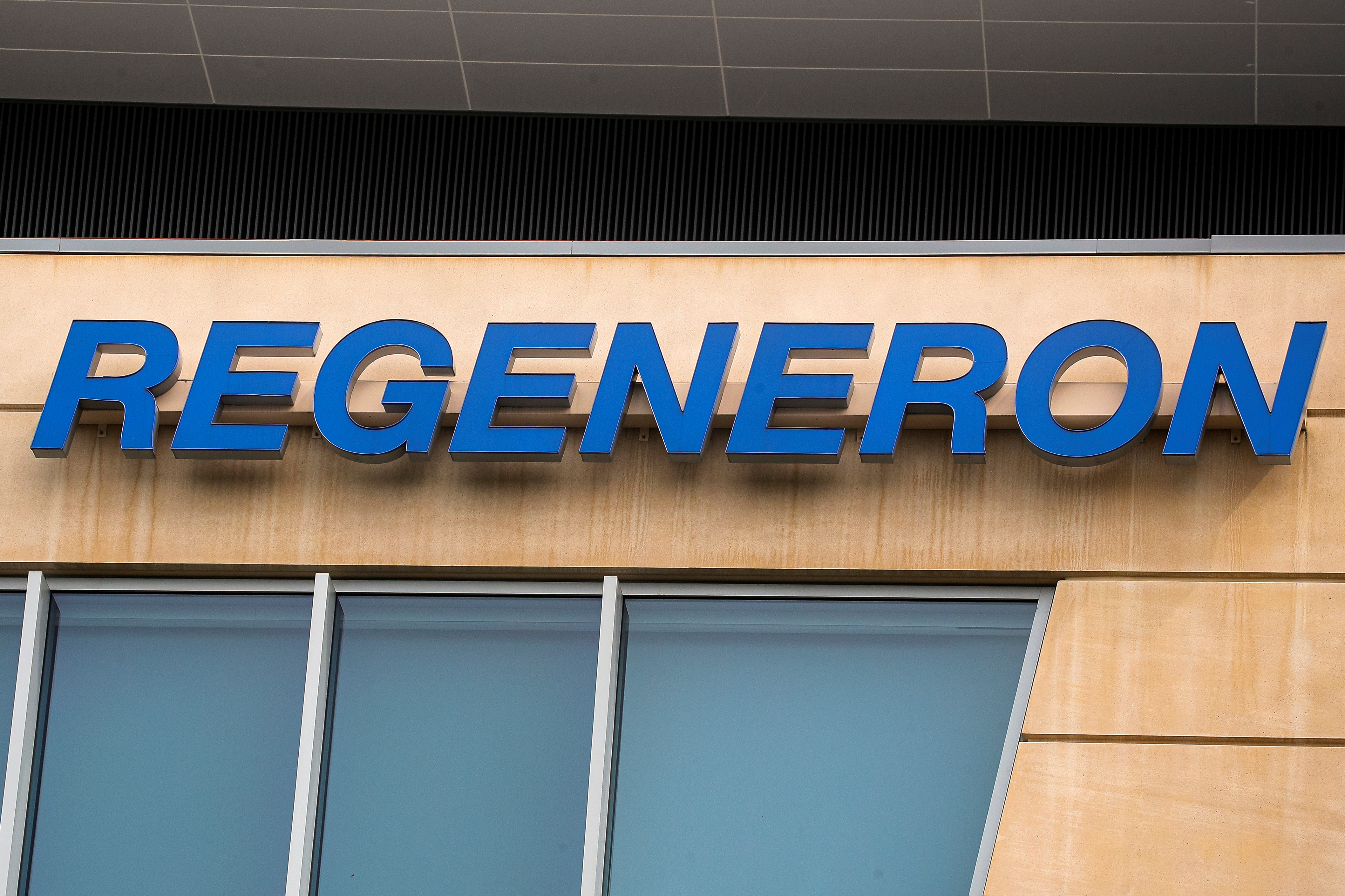 The Regeneron Pharmaceuticals company logo is seen on a building at the company's Westchester campus in Tarrytown, New York