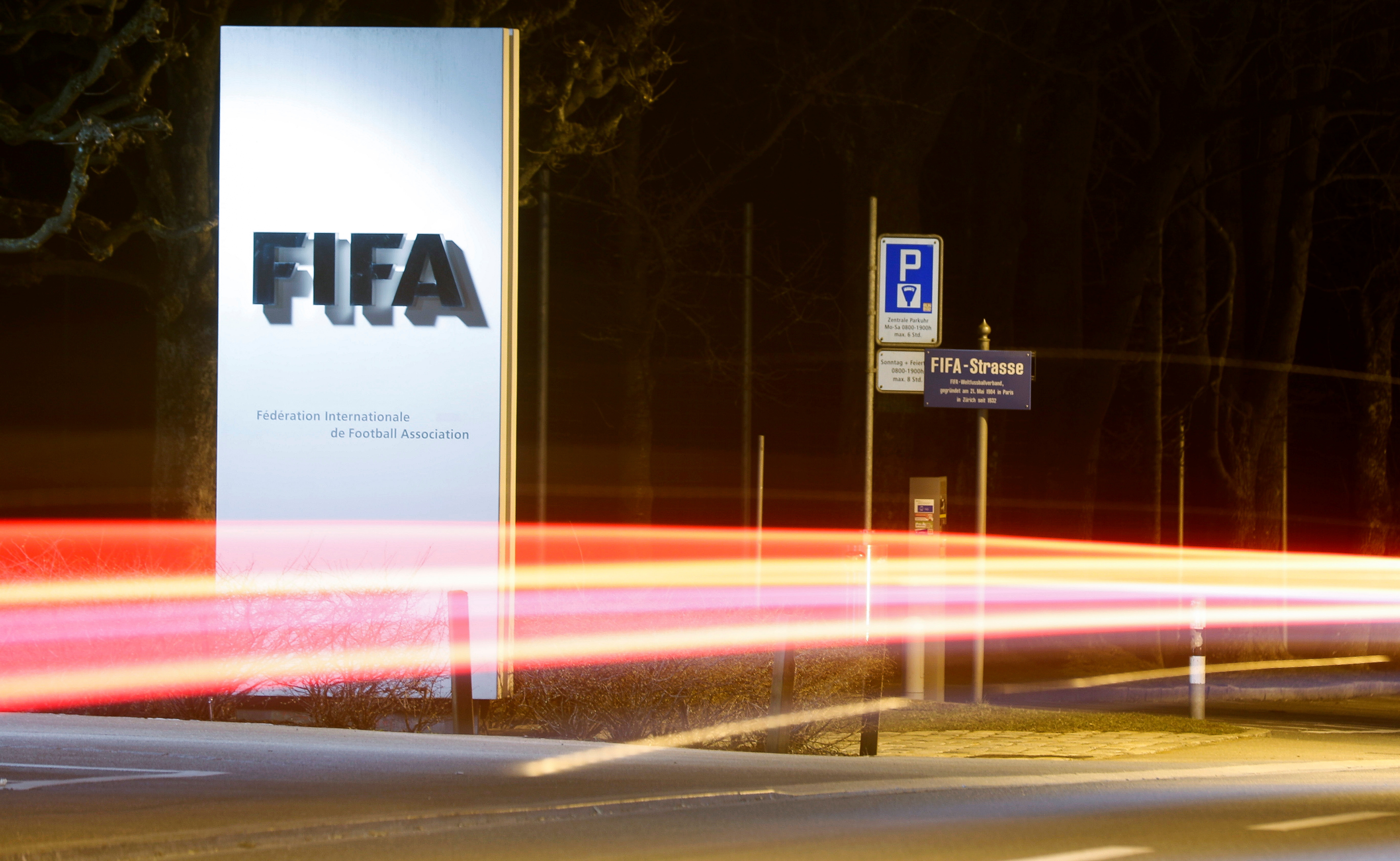 A long exposure shows FIFA's logo near its headquarters in Zurich
