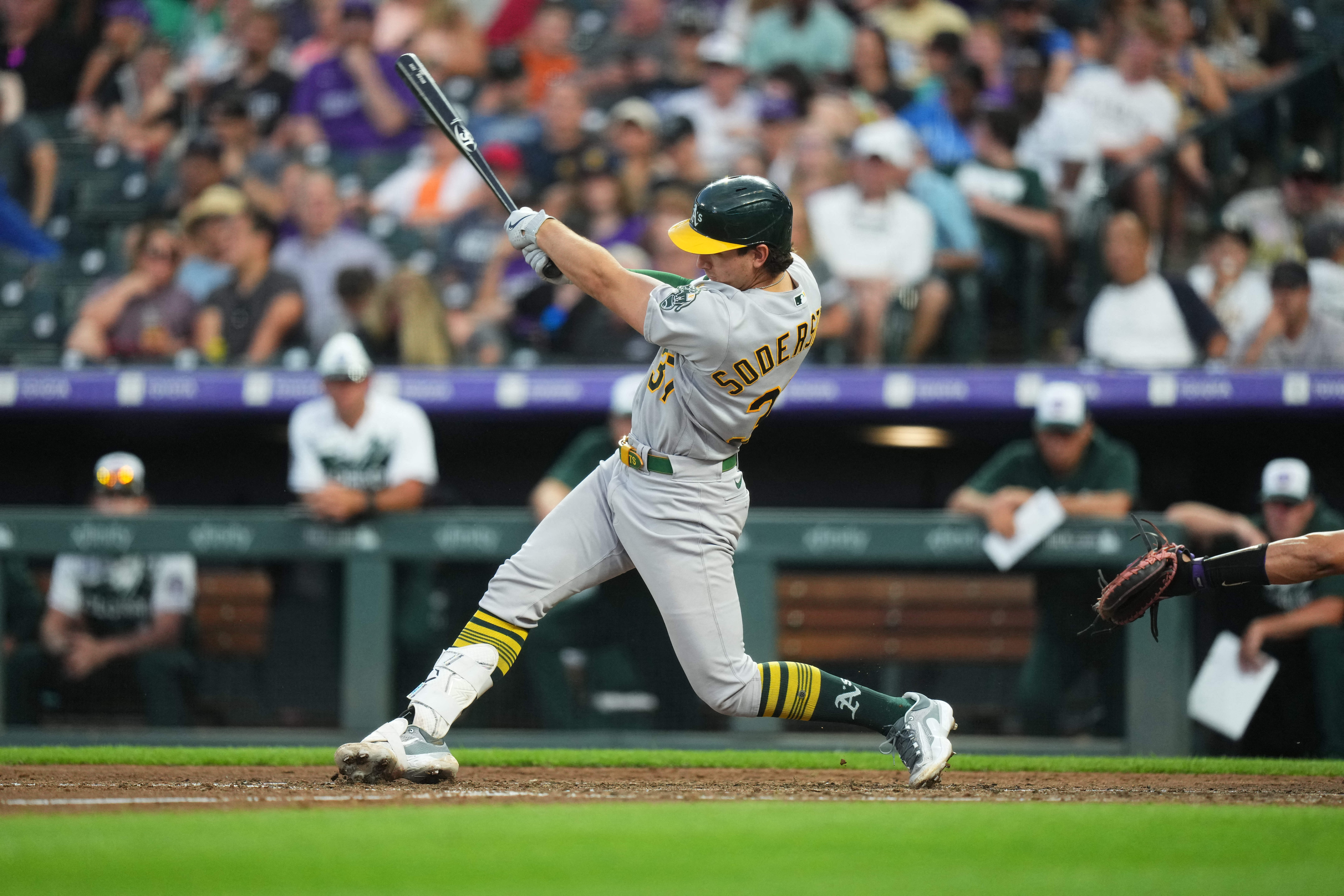 A's explode for 11 runs in walloping Rockies