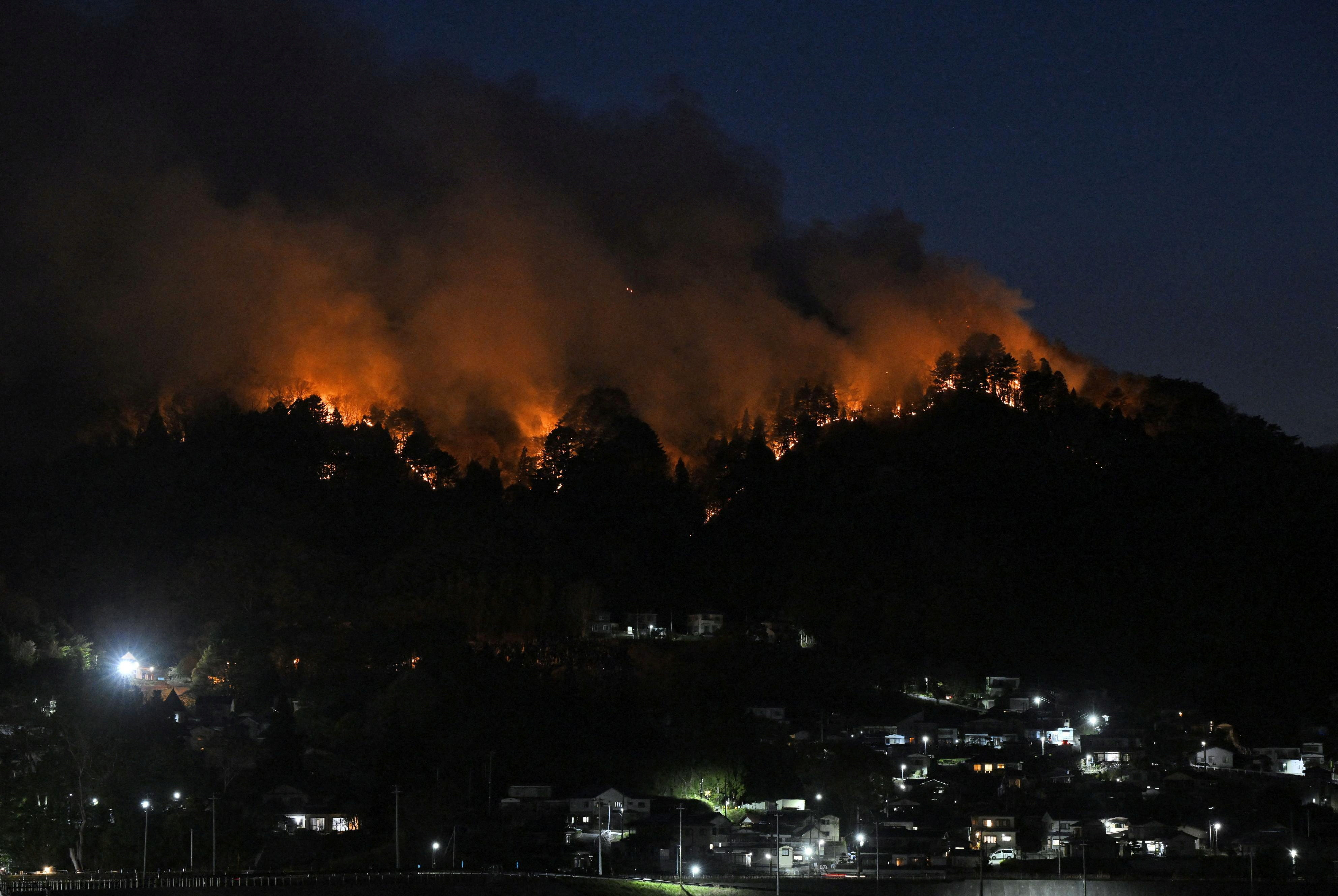 Northern Japan wildfires prompt mass evacuations as flames spread