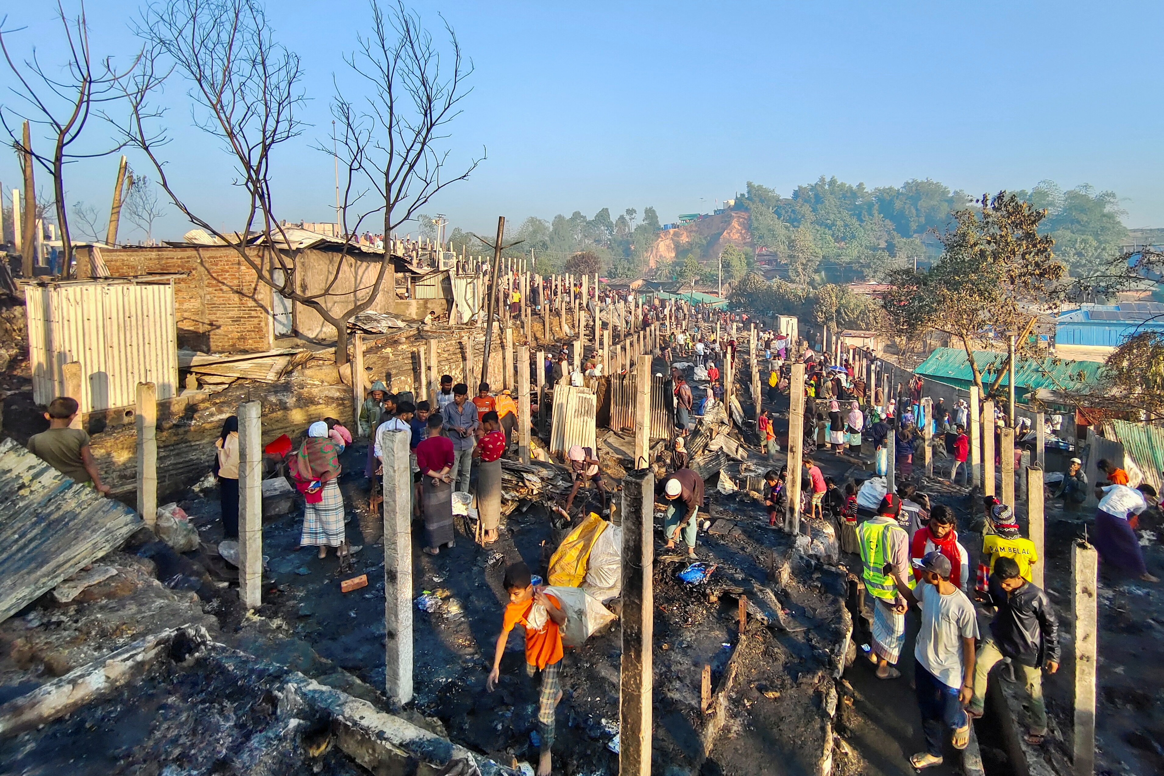 A general view of the burnt shelters after a massive fire broke out at the Balukhali Rohingya refugee camp in Cox's Bazar, Bangladesh, January 10, 2022. REUTERS/Stringer 