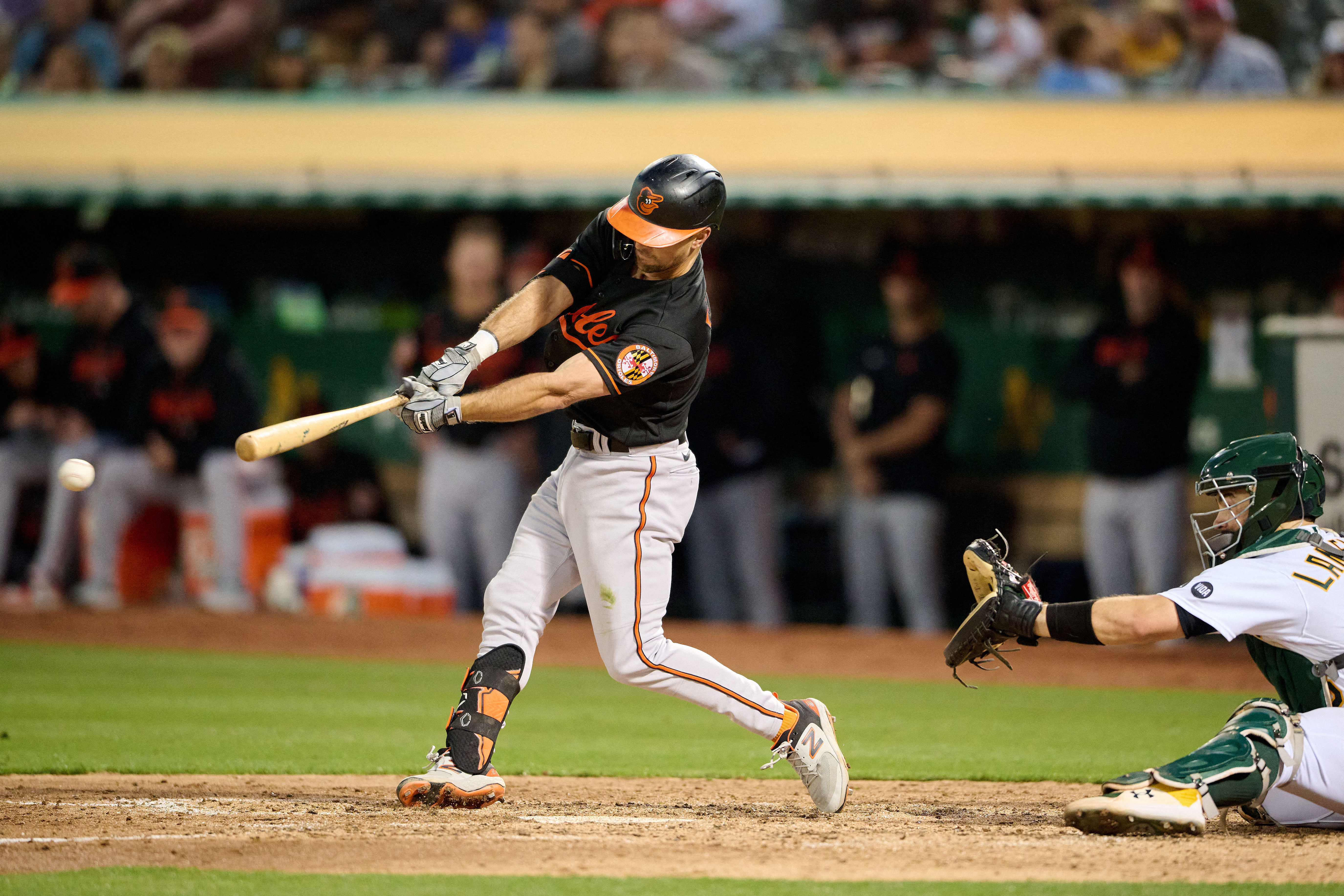 Orioles score early and often as they defeat Athletics