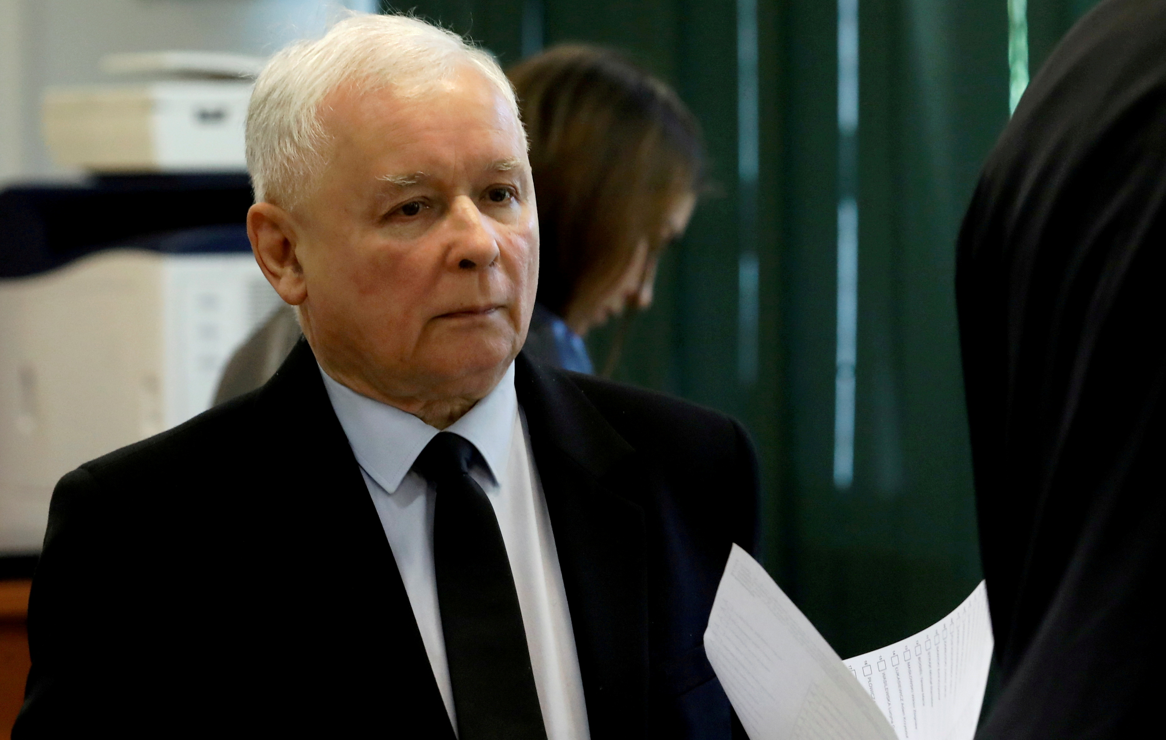 Jaroslaw Kaczynski, leader of the ruling Law and Justice (PiS) party, attends a vote during parliamentary elections at a polling station in Warsaw,