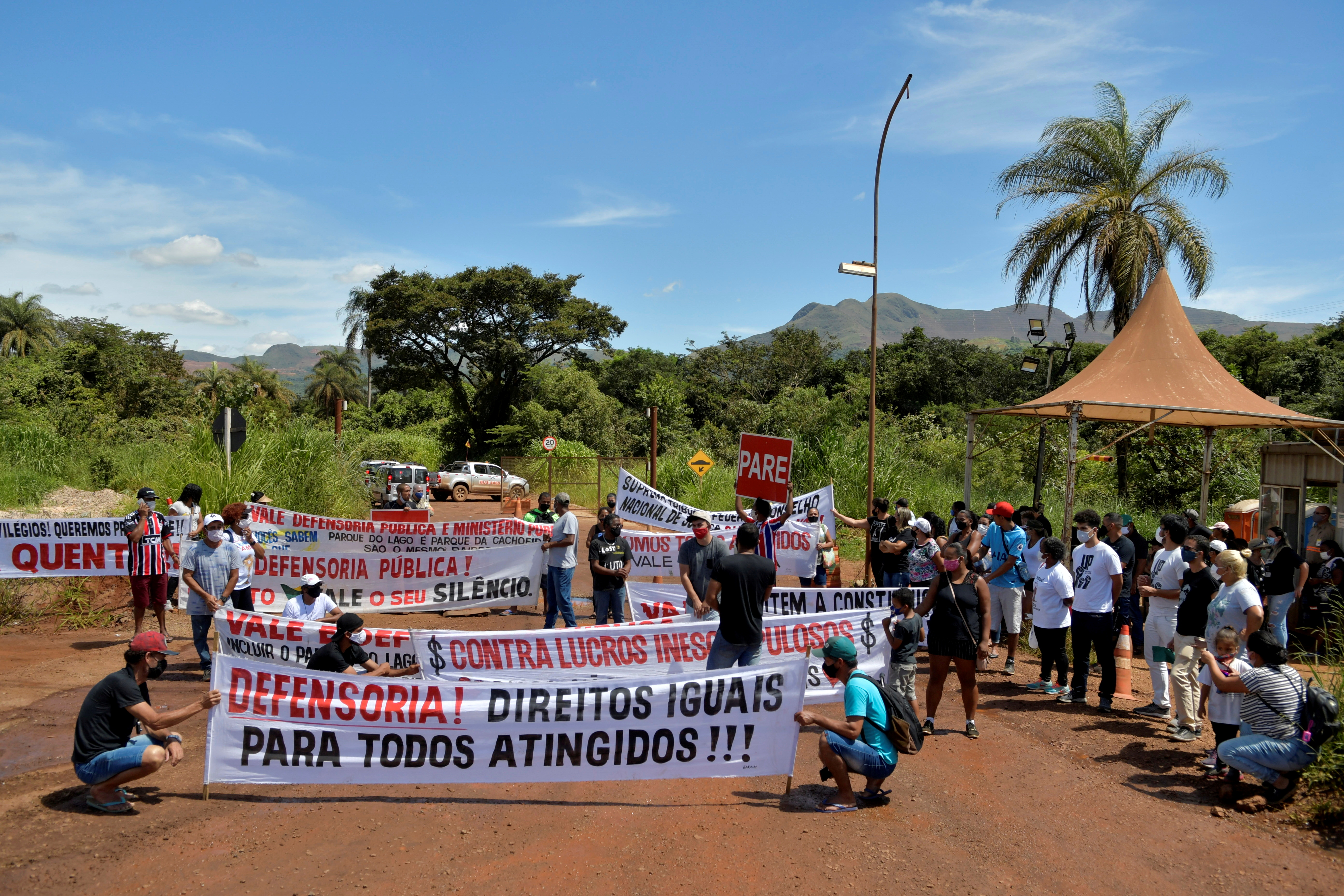 People affected by the disaster of the tailings dam owned by Brazilian mining company Vale SA, protest in front of the company, two years after it collapsed in Brumadinho