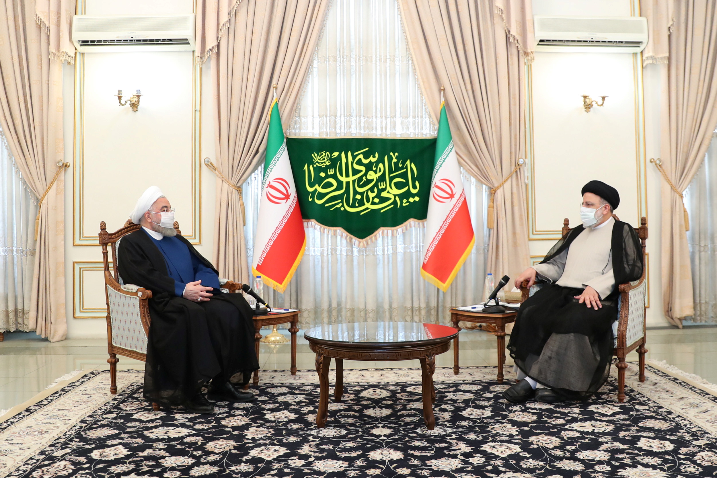 Iran's outgoing President Hassan Rouhani meets with Iran's President-elect Ebrahim Raisi in Tehran, Iran June 19, 2021. Official Presidential website/Handout via REUTERS  ATTENTION EDITORS - THIS IMAGE HAS BEEN SUPPLIED BY A THIRD PARTY. NO RESALES. NO ARCHIVES.
