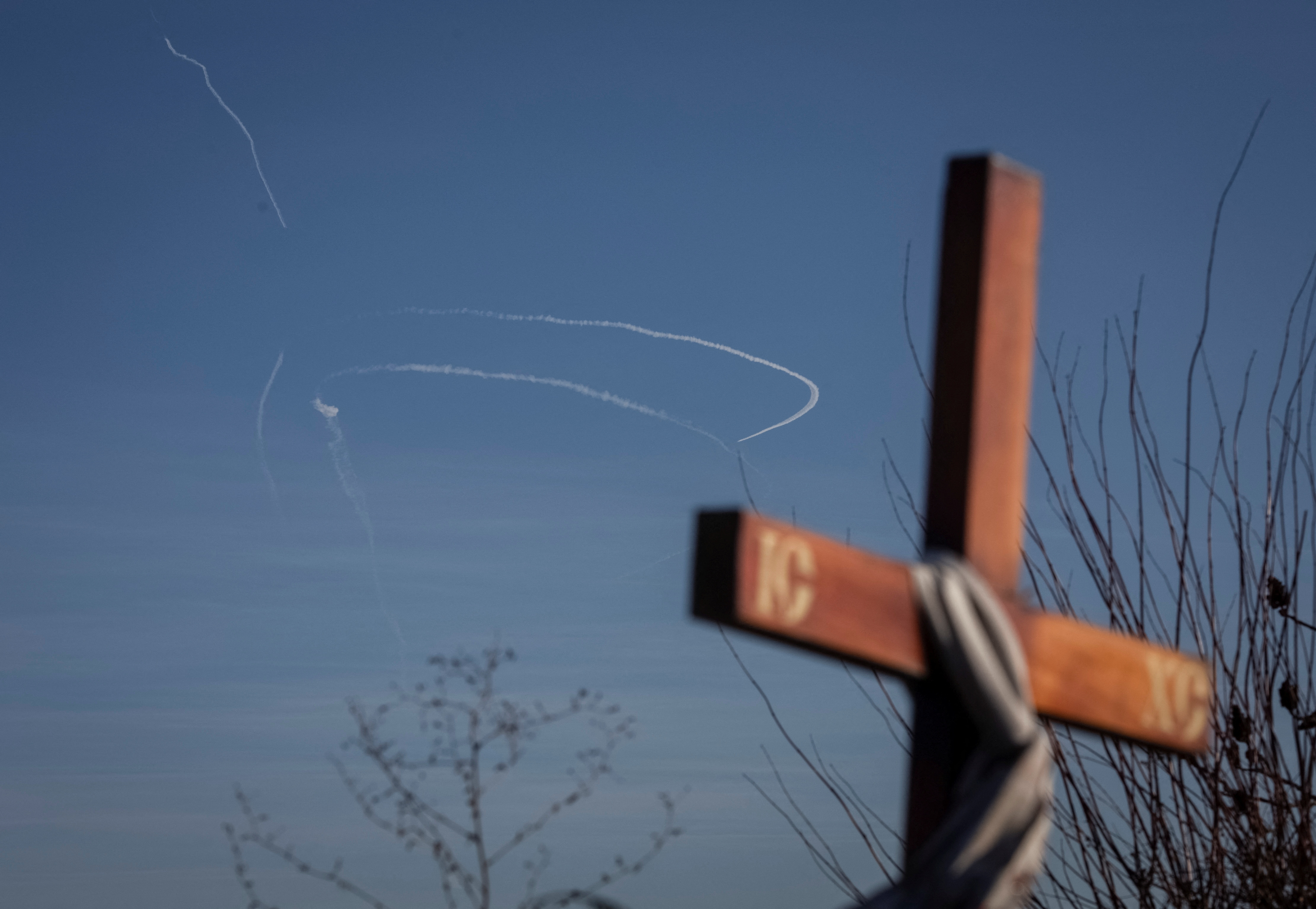 A missile trace is seen in a sky, as Russia's attack on Ukraine continues, near Bakhmut